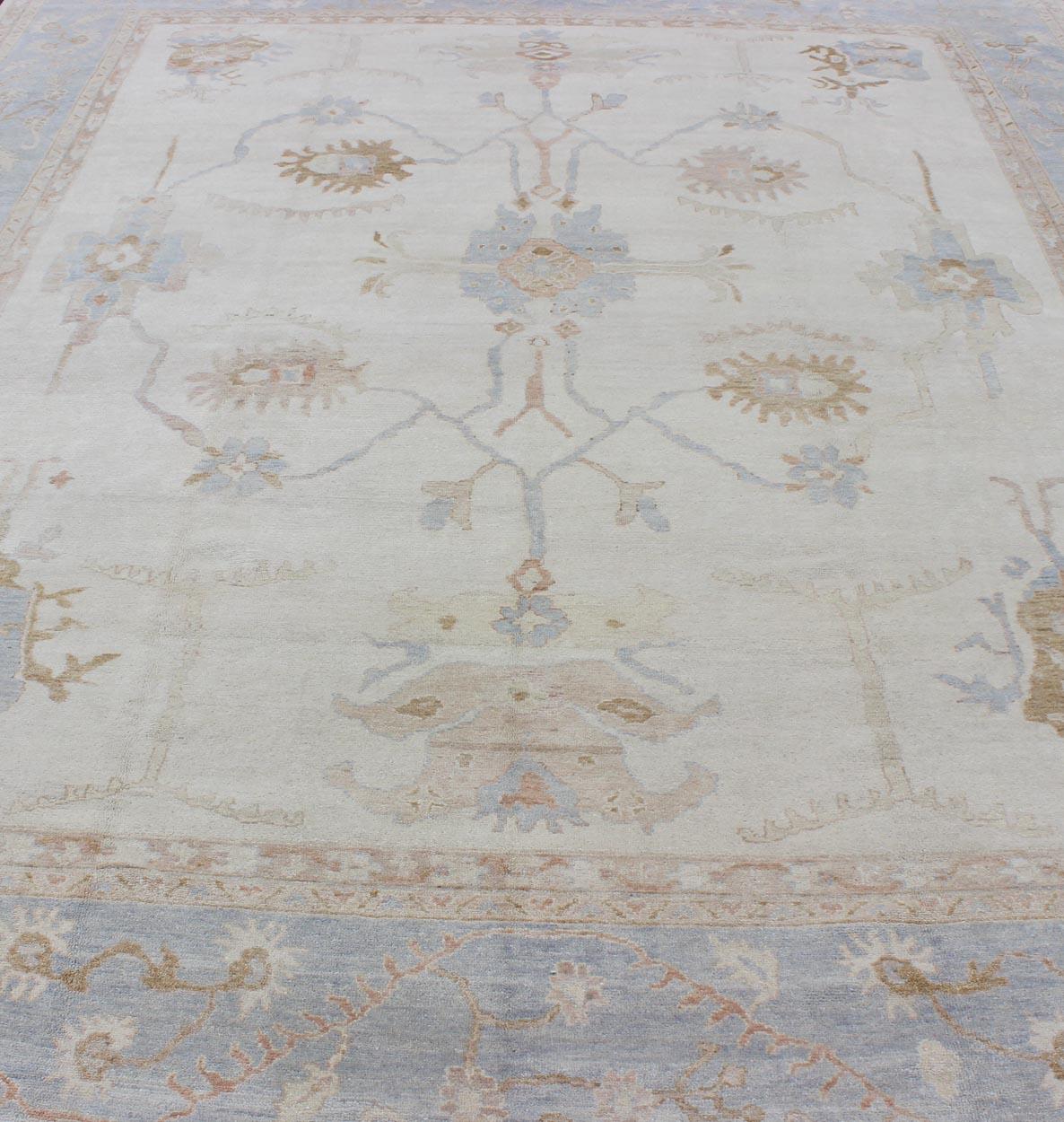 Large Oushak Rug in Blue, Light Brown, and White In Excellent Condition In Atlanta, GA