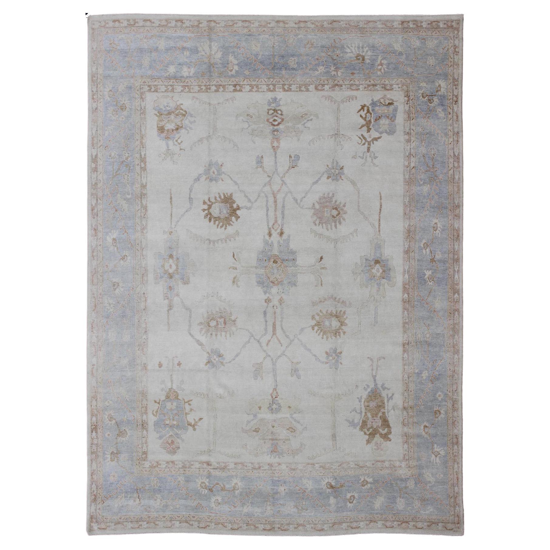 Large Oushak Rug in Blue, Light Brown, and White