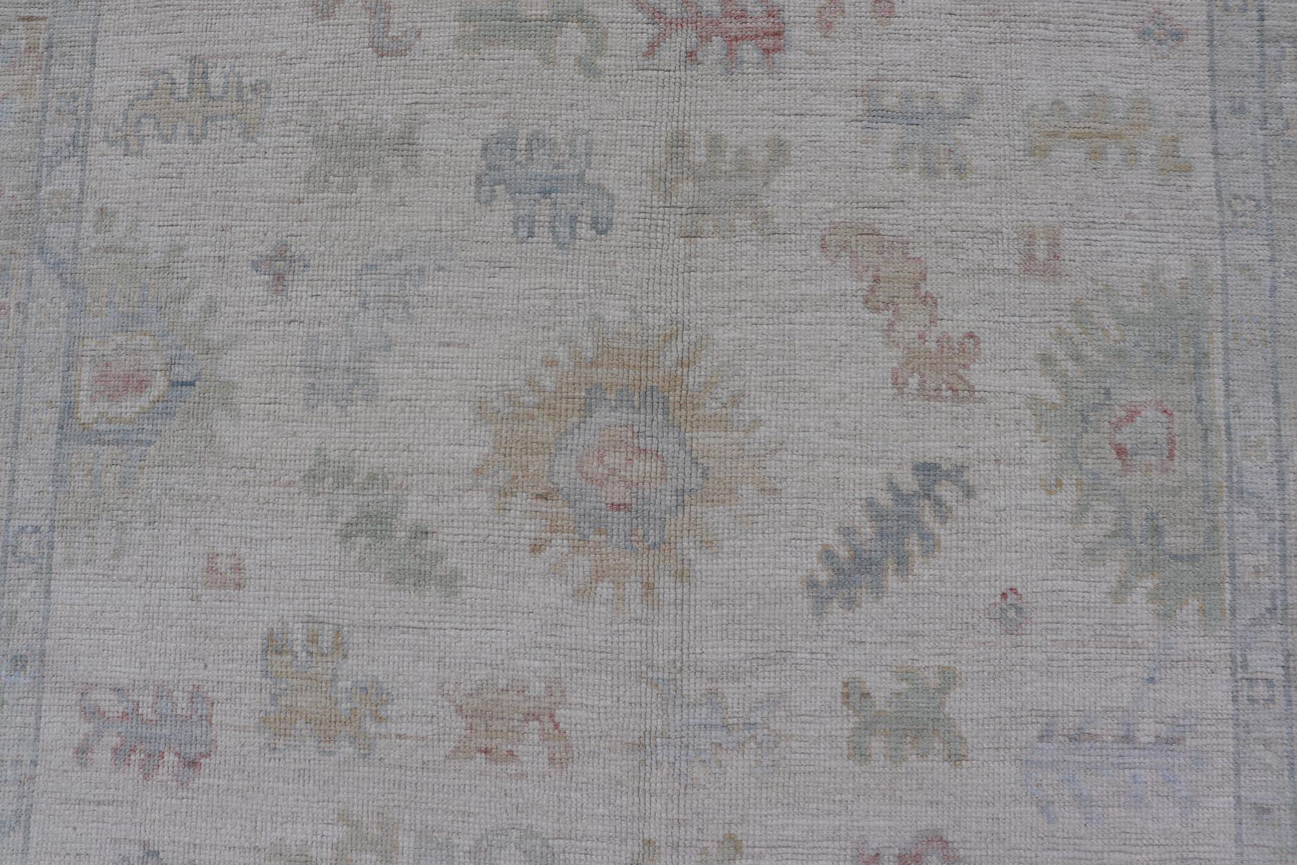 Large Oushak Rug with Floral Motifs & Muted Colorful Tones on Neutral Background For Sale 6