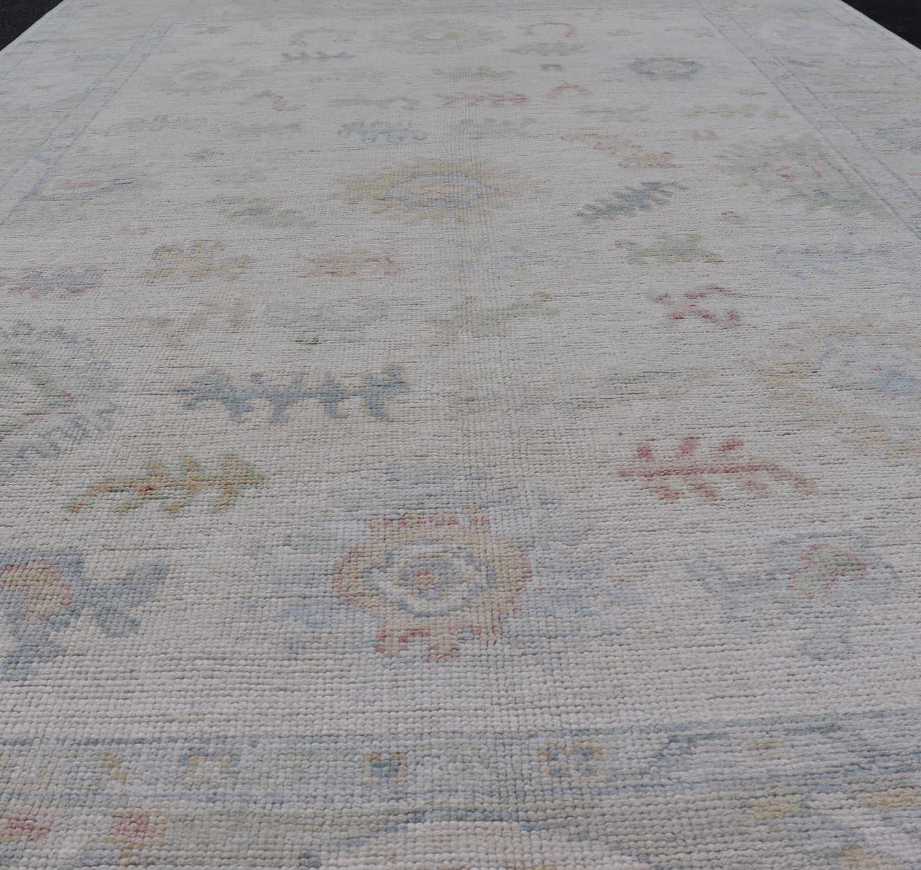 Large Oushak Rug with Floral Motifs & Muted Colorful Tones on Neutral Background For Sale 2