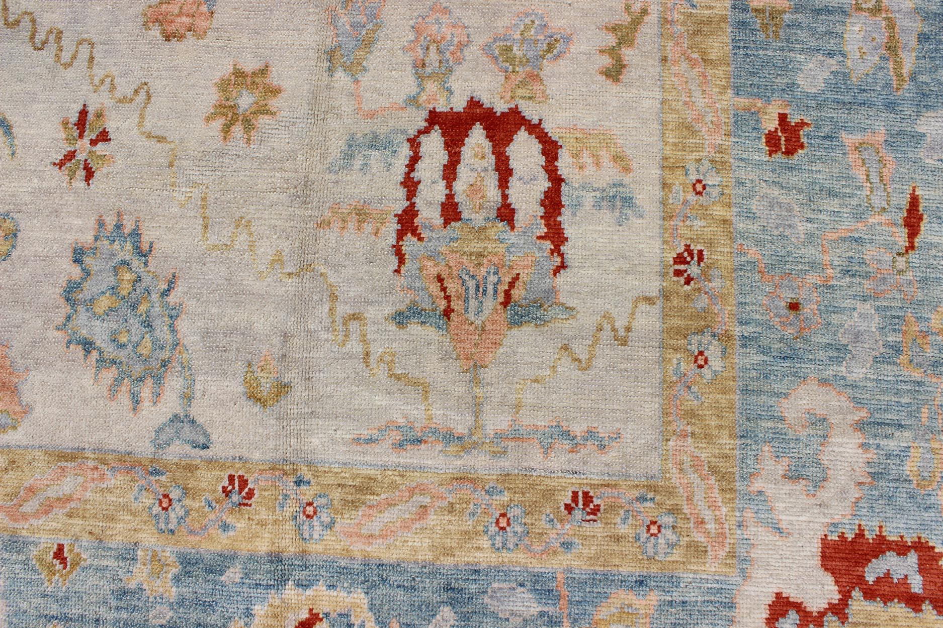 Large Oushak Turkish Rug with All Over Design in Light Blue, Ivory & Red For Sale 4