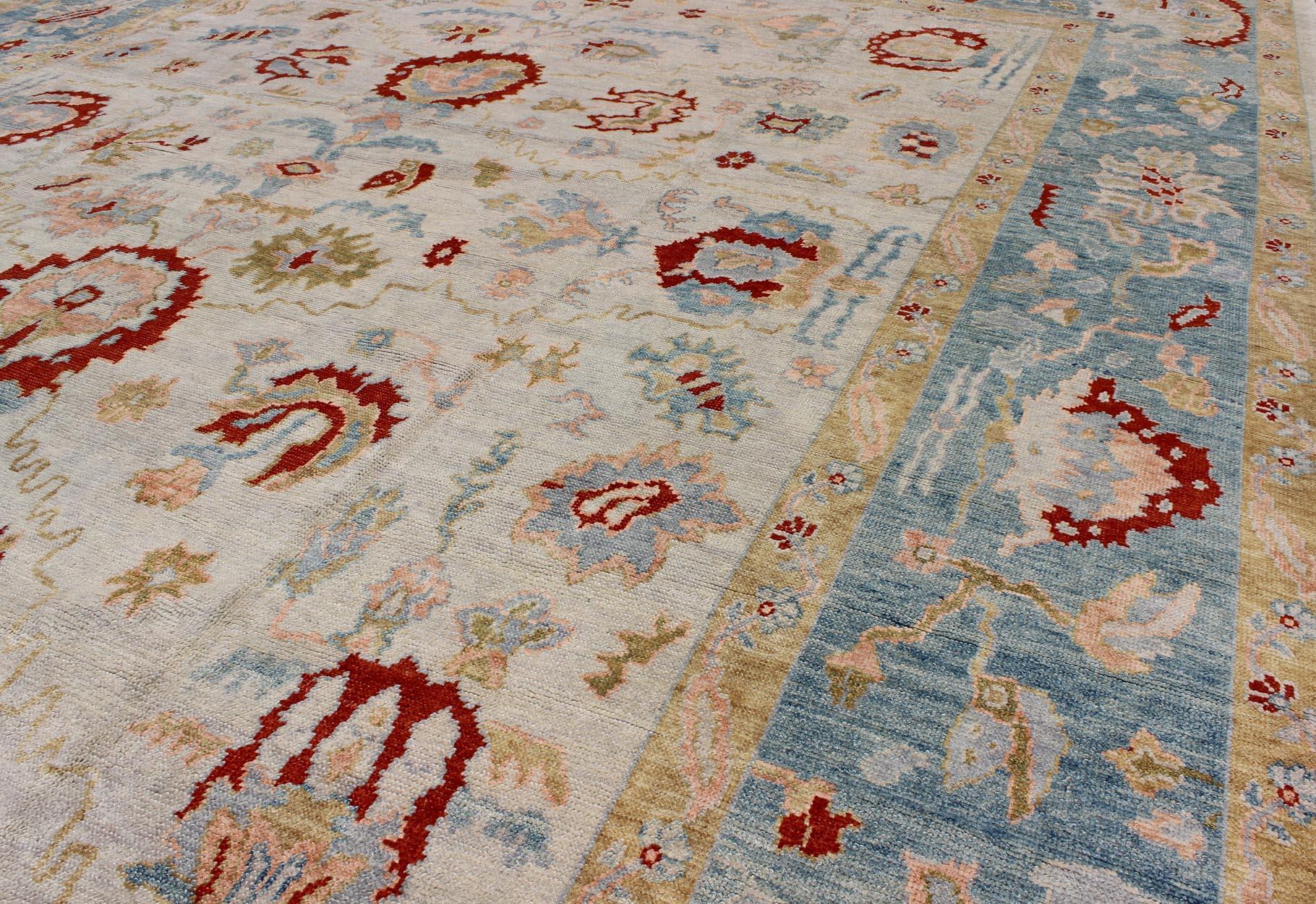 Large Oushak Turkish Rug with All Over Design in Light Blue, Ivory & Red  In Excellent Condition For Sale In Atlanta, GA