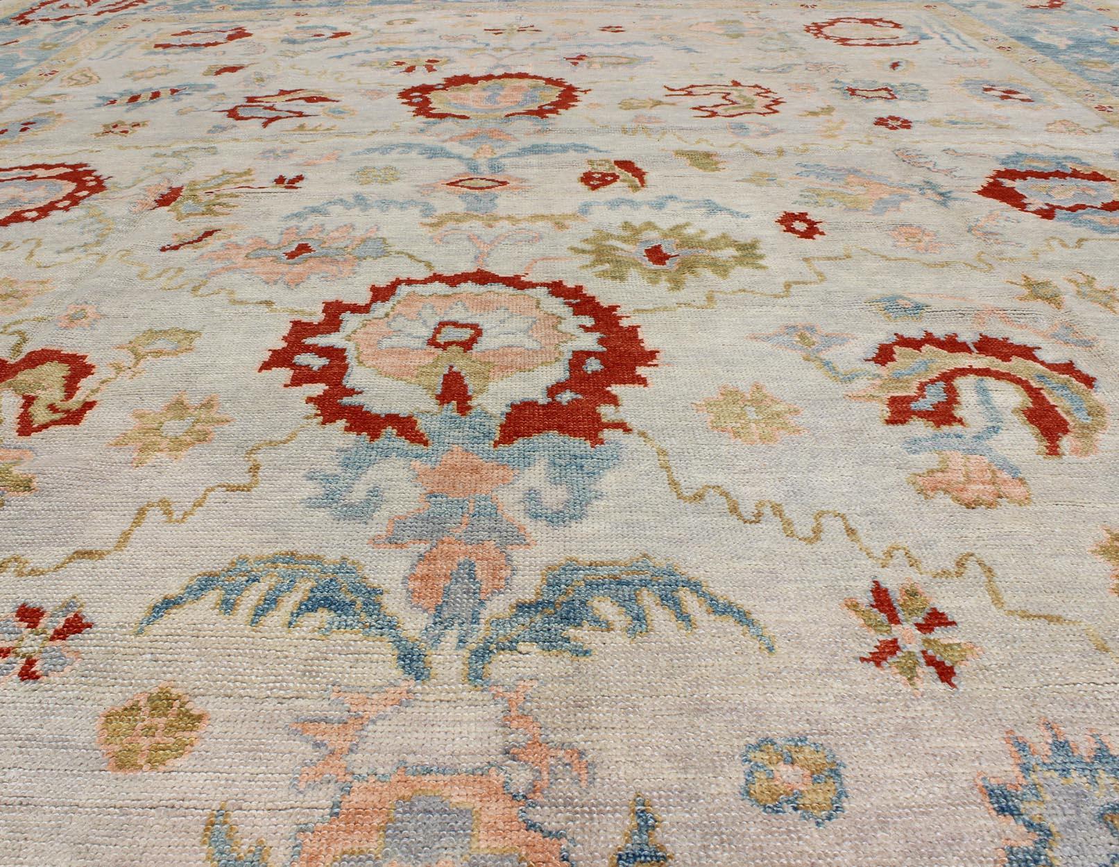 Wool Large Oushak Turkish Rug with All Over Design in Light Blue, Ivory & Red For Sale