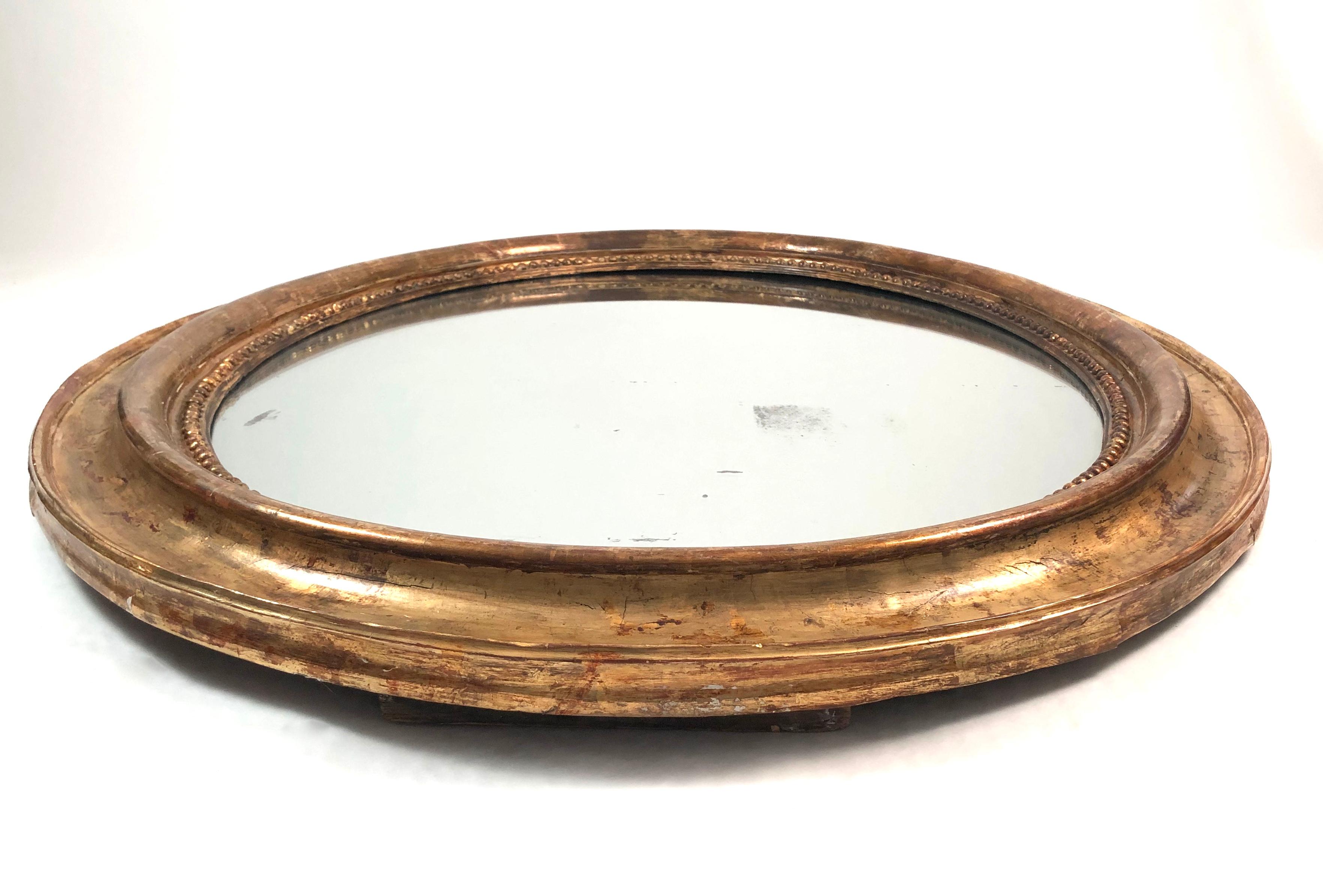 Carved Large Oval 19th Century French Giltwood Mirror