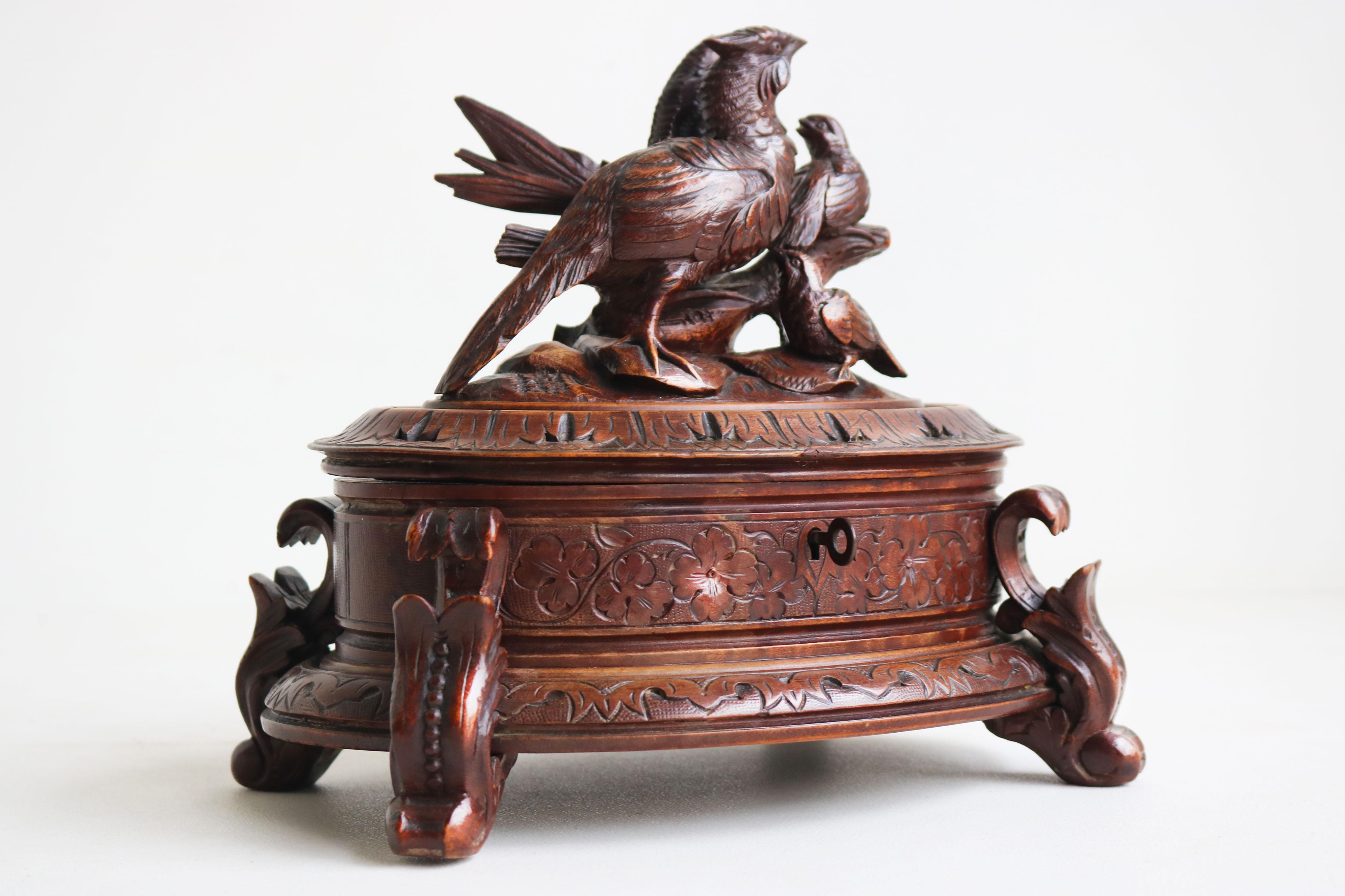 Carved large oval Antique swiss 19th century Black Forest jewelry box walnut 3 birds For Sale