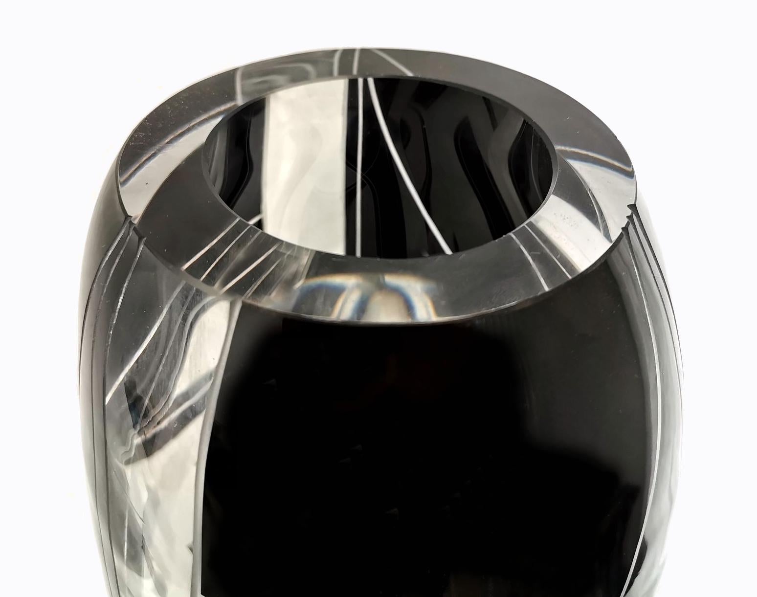 Rare and very stylish is this highly decorated geometric patterned vase which dates to the 1930s. With the black enamel decoration against clear and etched glass makes a very striking design, simple but very elegant. Very weighty, the glass being