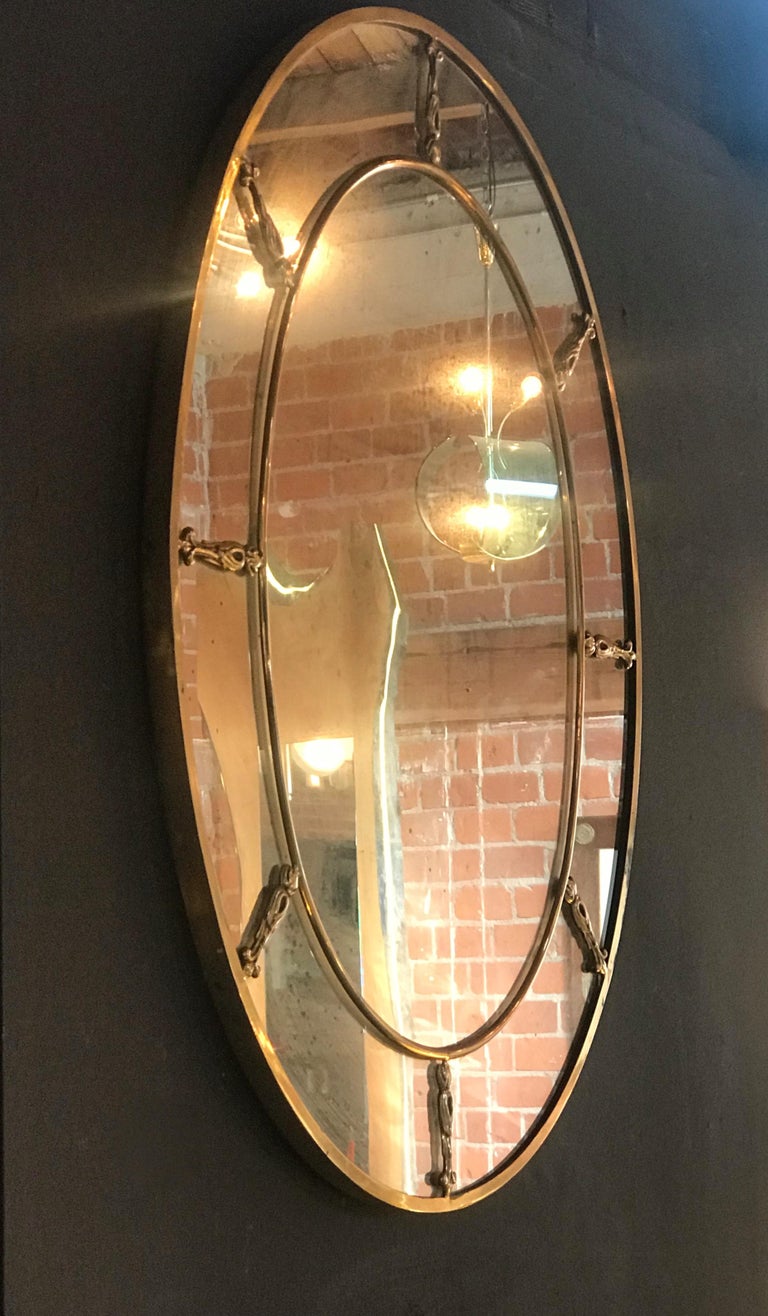 Large Oval Art Deco Mirror with Brass Decorations, Italy, 1930s at
