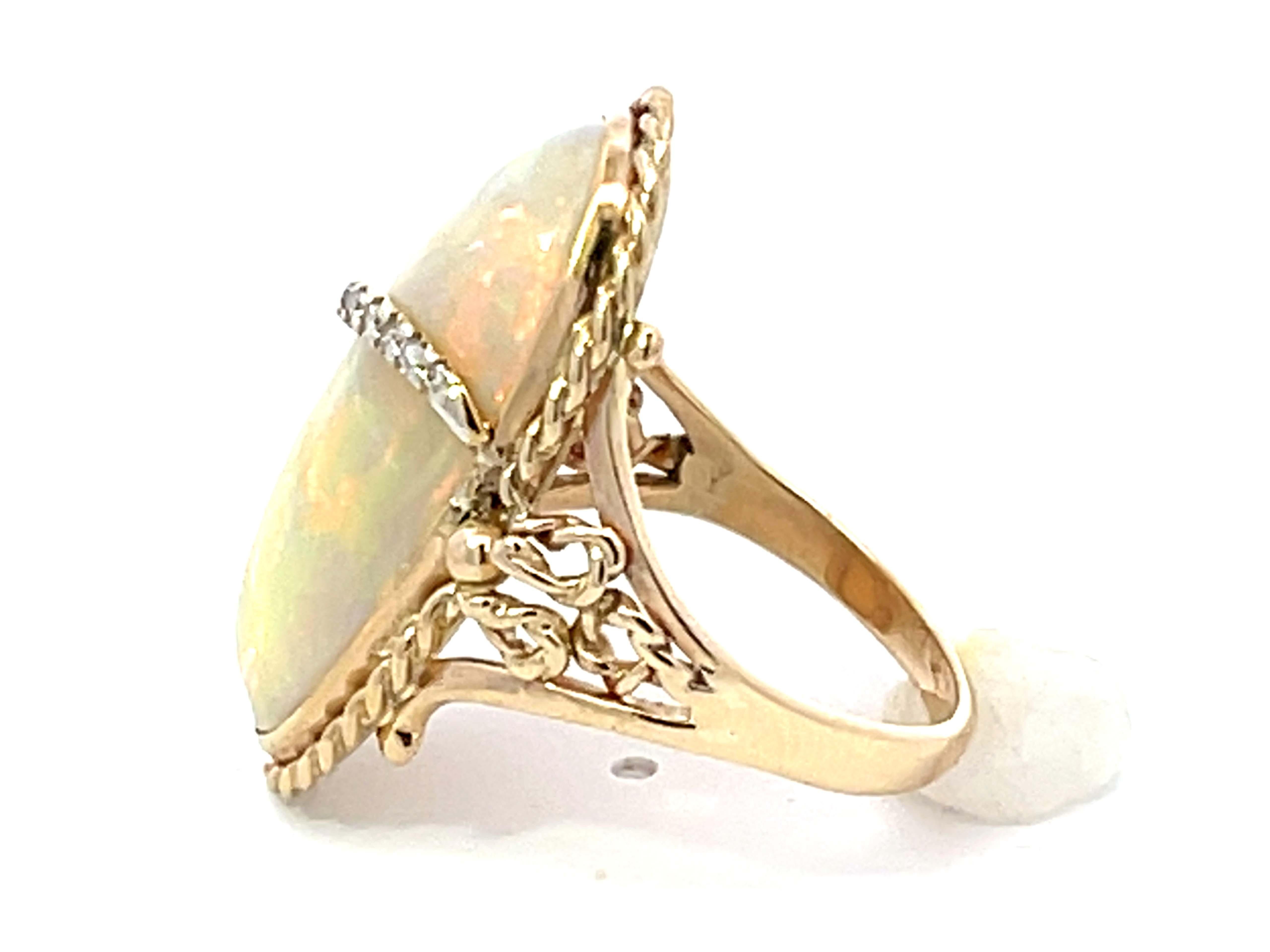 Large Oval Cabochon Opal and Diamond Ring in 14k Yellow Gold In Excellent Condition For Sale In Honolulu, HI