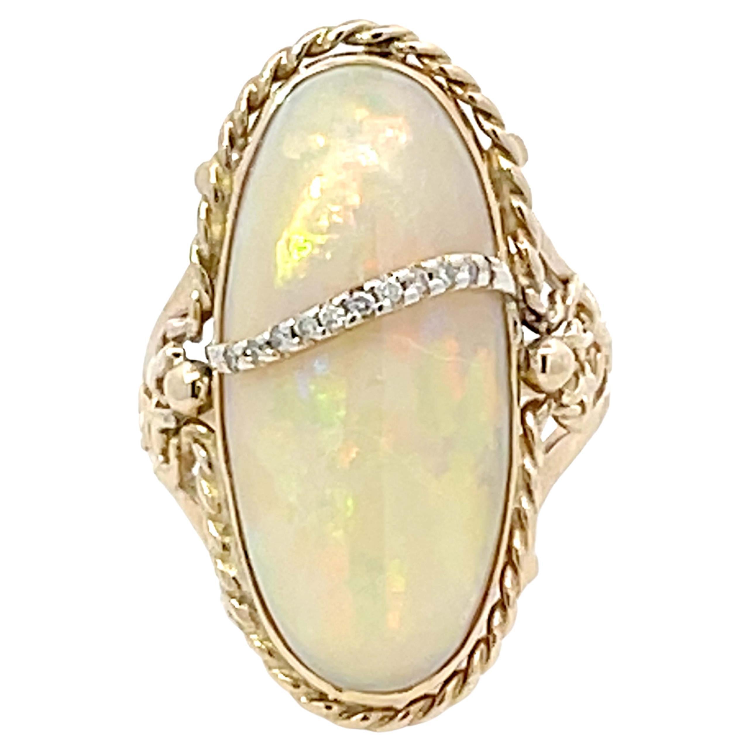 Large Oval Cabochon Opal and Diamond Ring in 14k Yellow Gold For Sale
