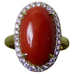 Large oval Coral and Diamond Cluster Ring