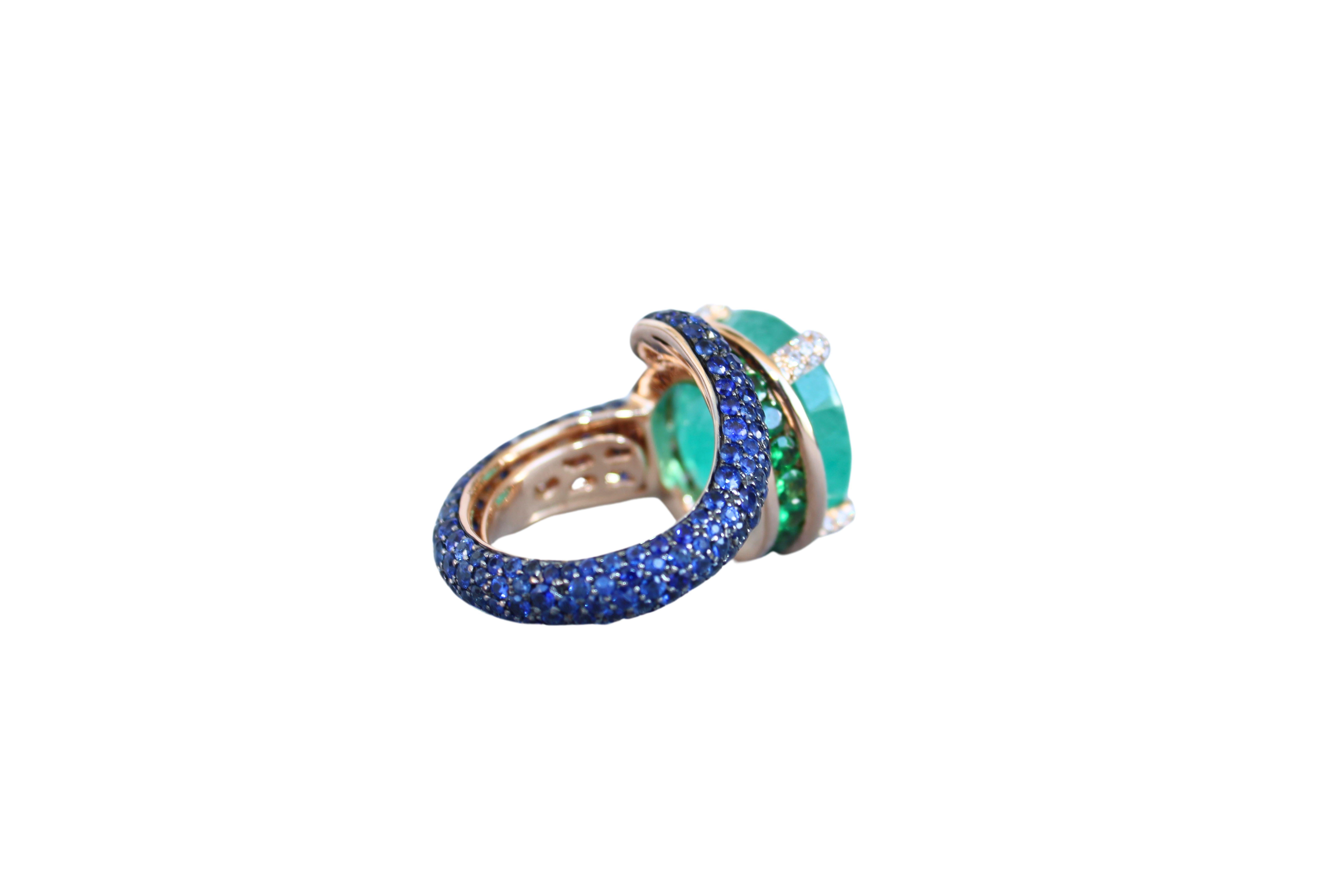 Modern Large Oval Cut Emerald Full Pave Tsavorites Diamonds Sapphires 18K Gold Ring For Sale