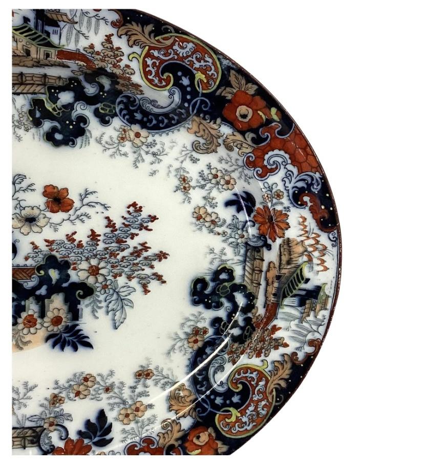Rare 19th century English Ridgeway Imari pattern oval serving platter in excellent condition. The Bow and Quiver trade mark on reverse side was registered by Ridgeways in 1880. Reverse also has 