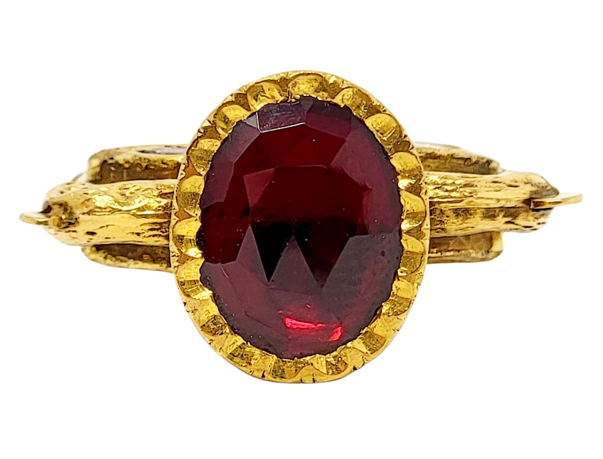 Ring size: 9

Incredible 21K yellow gold, almandine garnet and diamond Polki high profile cocktail ring makes a bold statement. Featuring a colorful gemstone paired with a detailed peacock design, this unique ring is an absolute work of art. The