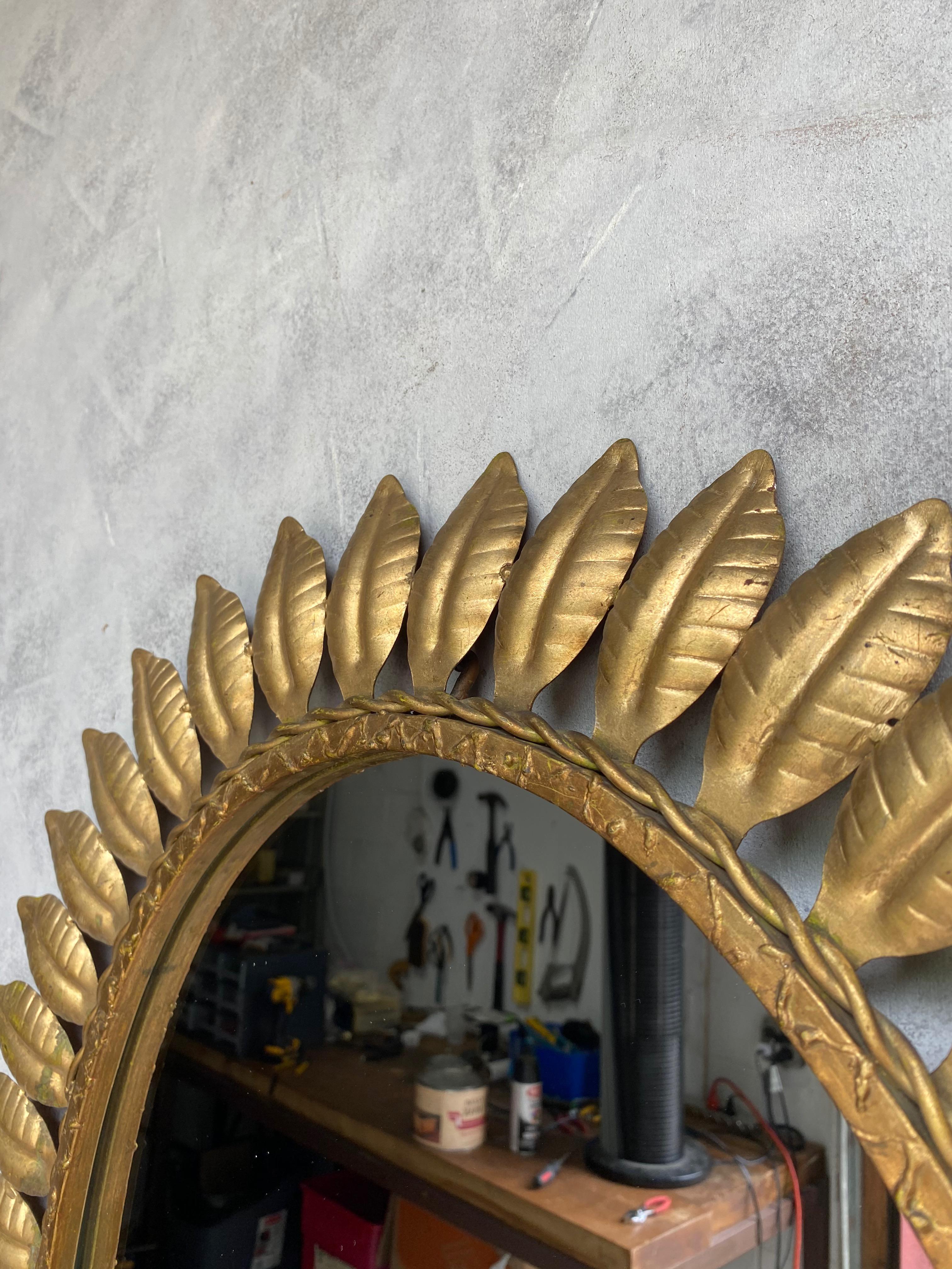 Mid-20th Century Large Oval Gilt Metal Sunburst Mirror with Leaves