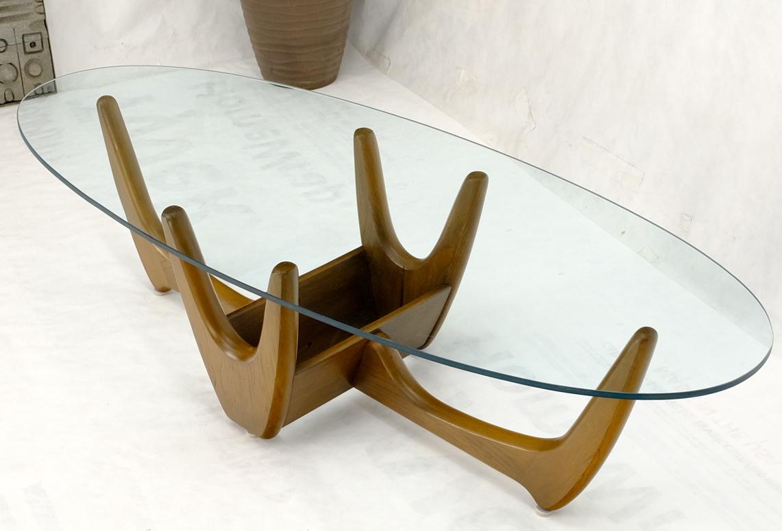 Mid-Century Modern oval glass top coffee table Pearsall, Noguchi, Kagan decor match. Organic forms solid wood base.