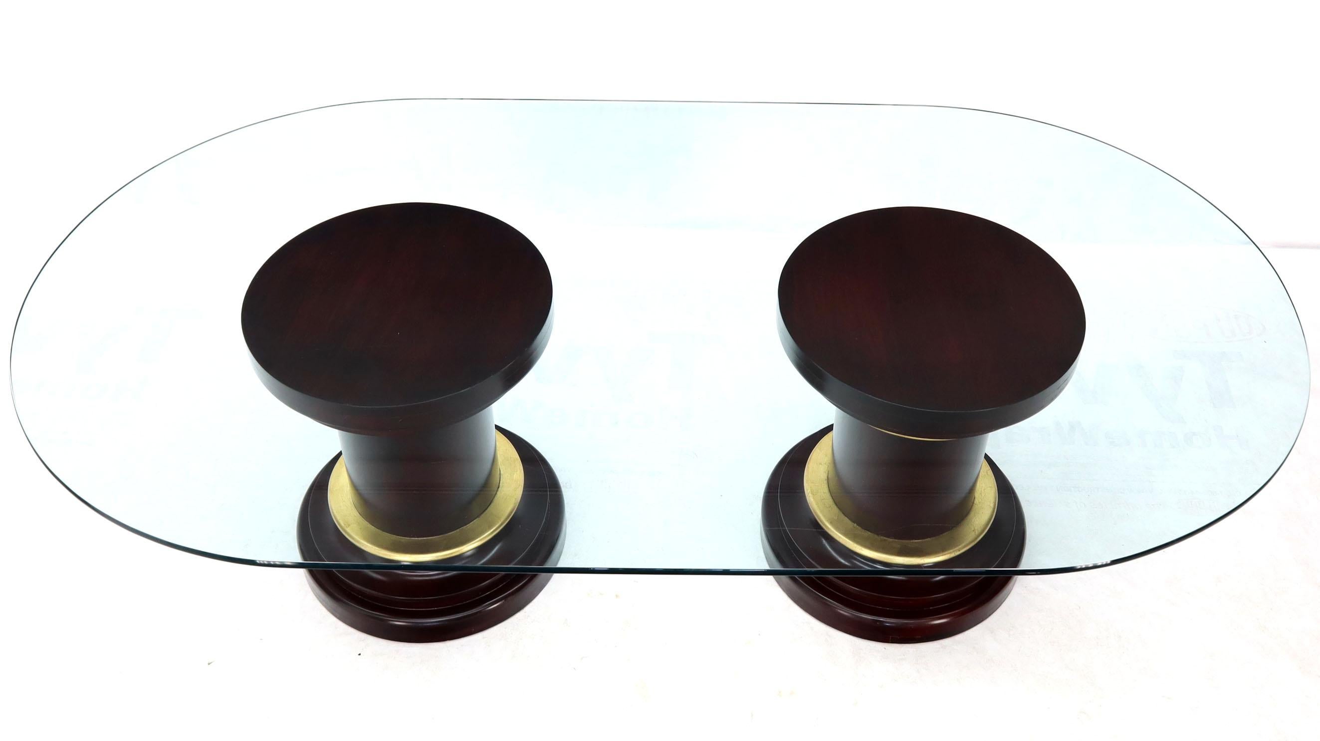 Mid-Century Modern Large Oval Glass Top Two Round Turned Mahogany Pedestal Bases Dining Table For Sale