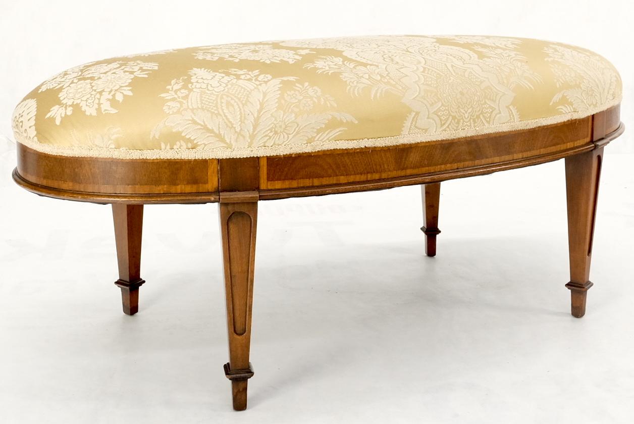 Large oval golden upholstery flame inlaid mahogany frame federal bench ottoman.