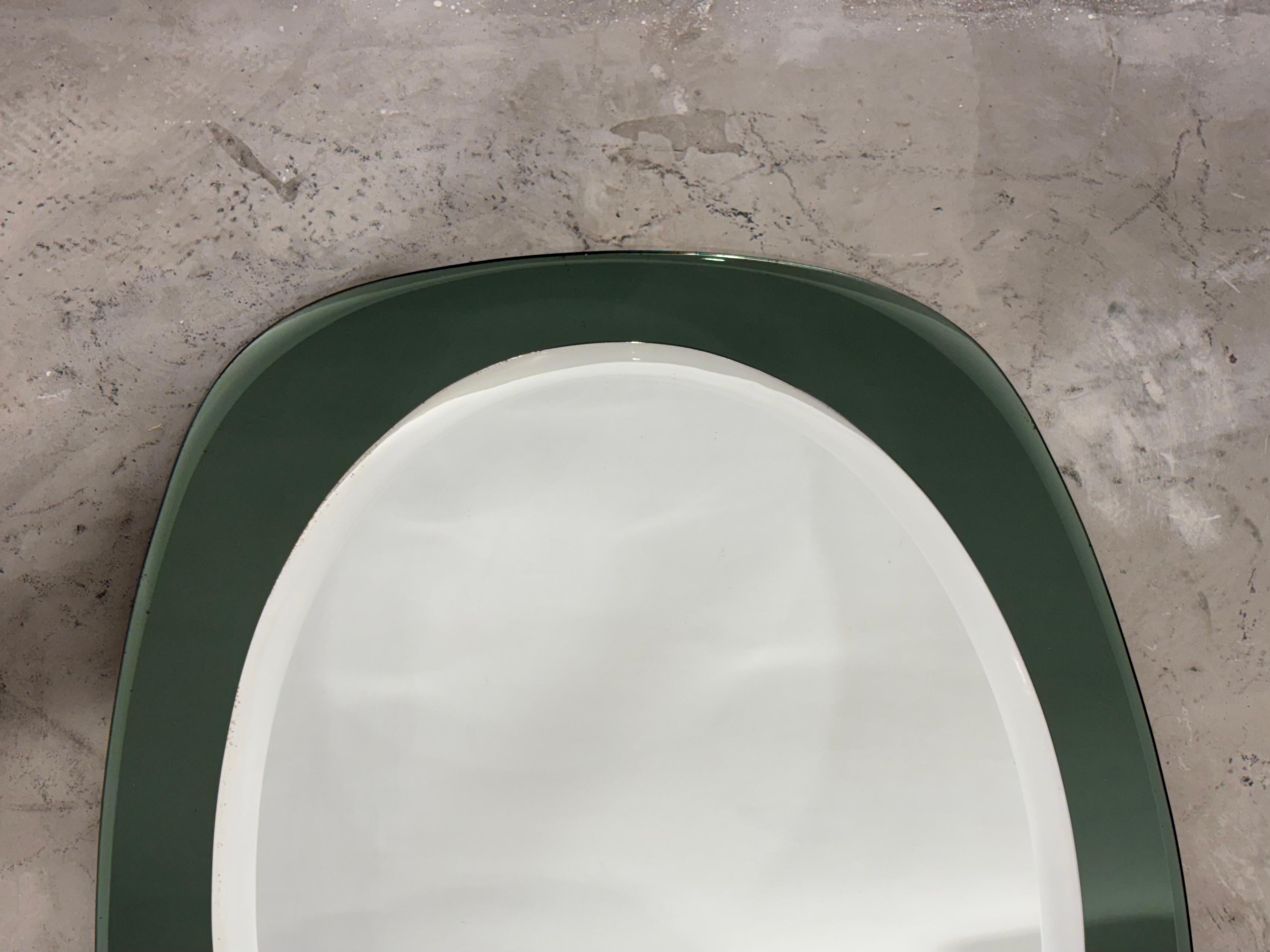 Mid-Century Modern Large Oval Italian mirror, emerald green mirrored glass frame from Cristal Art For Sale