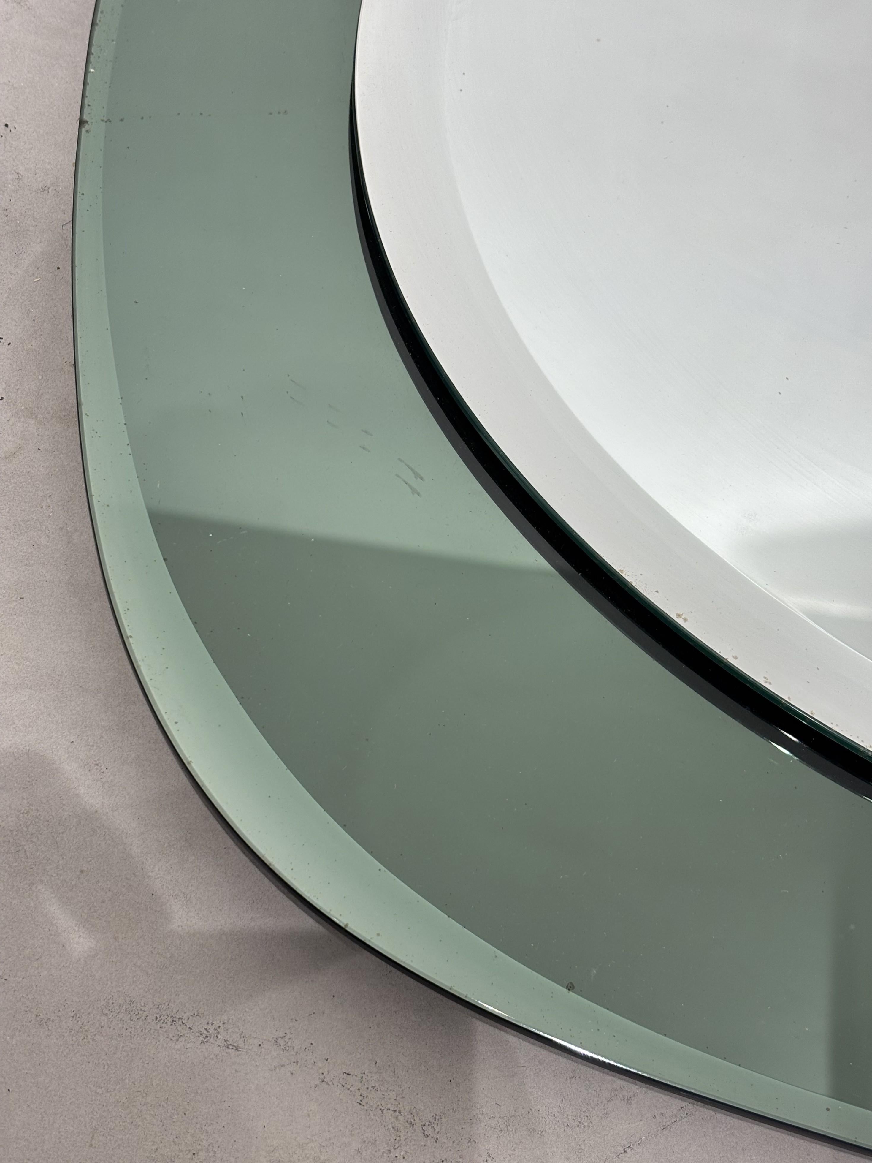 Late 20th Century Large Oval Italian mirror, emerald green mirrored glass frame from Cristal Art For Sale