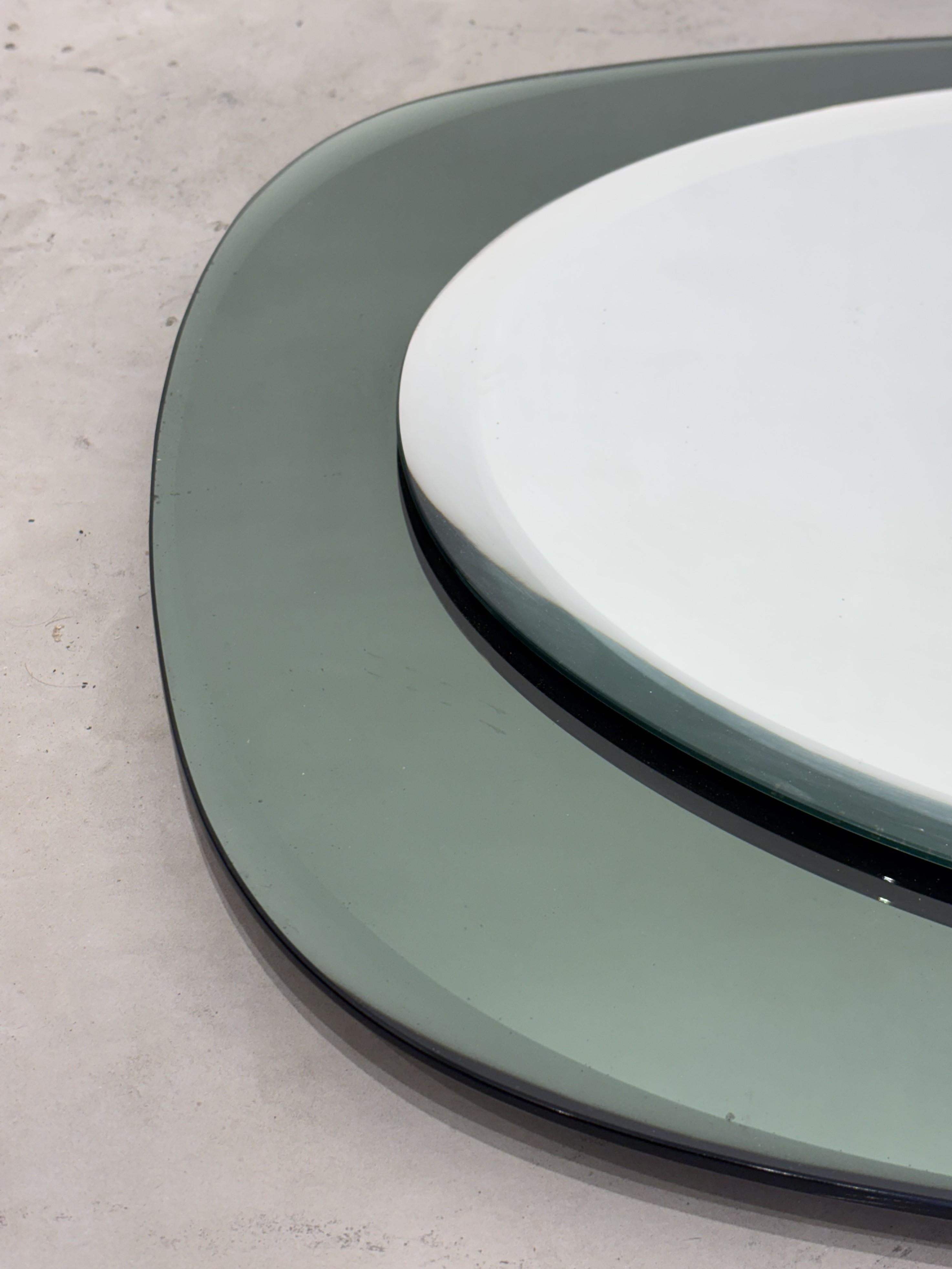 Glass Large Oval Italian mirror, emerald green mirrored glass frame from Cristal Art For Sale