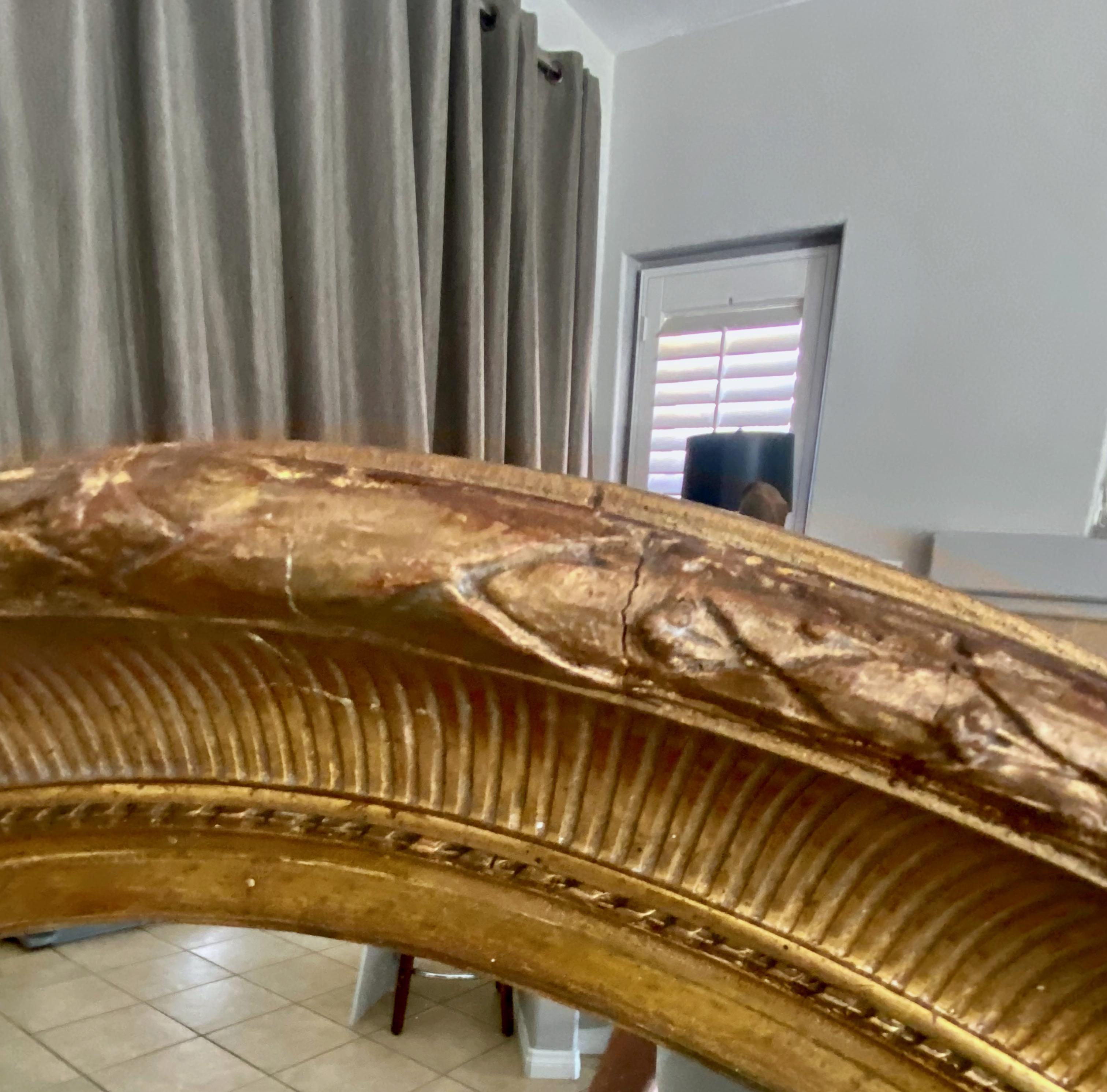 Grand miroir mural ovale en bois doré Louis XVI du 19ème siècle 8