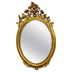 Large Oval Louis XVI Style Giltwood Mirror, 19th Century