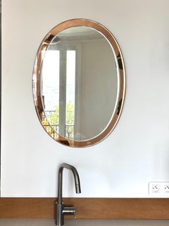 Large oval Miroir by Antonio Lupi, frame in copper pink tinted mirror