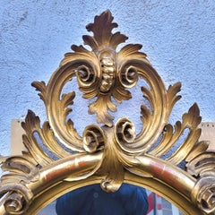 Large Oval Mirror In Carved Gilt Wood, 19th Century