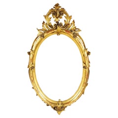 Large Oval Mirror In Carved Gilt Wood, 19th Century