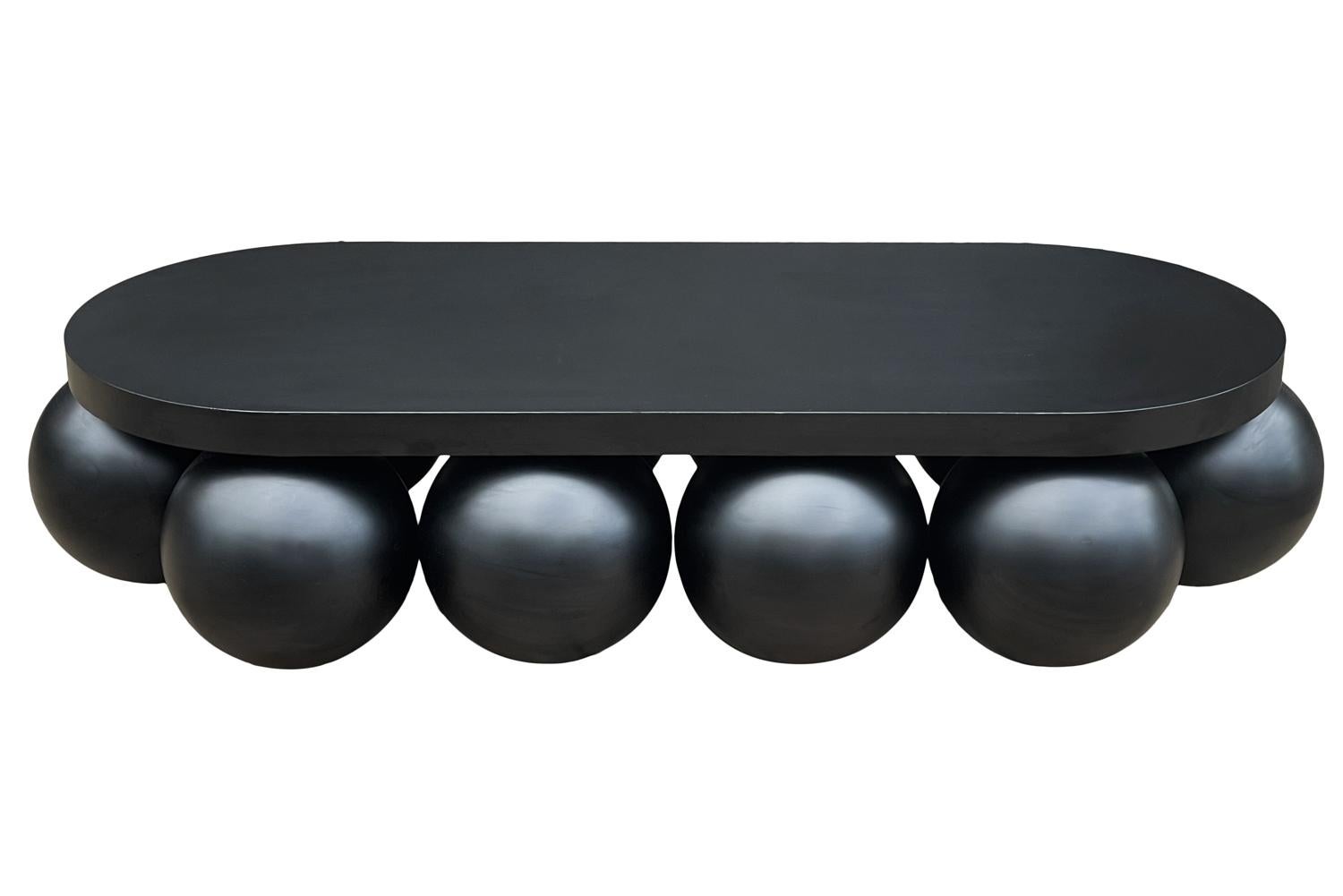 A large an impressive post modern design coffee table. It features all enameled metal construction with racetrack oval top.