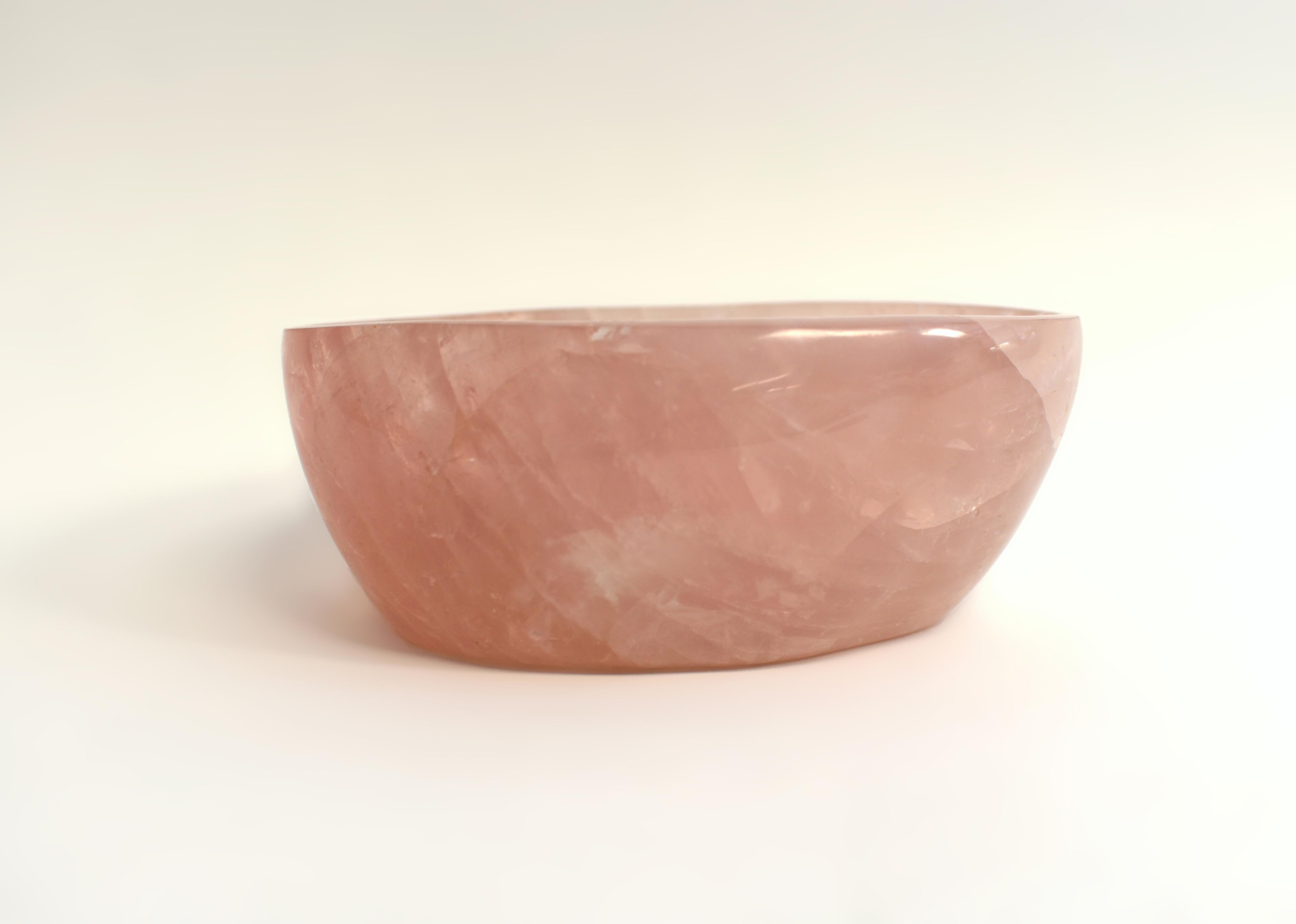 A beautiful large rose quartz bowl weighing 4.15 lbs. Of ovoid form with smooth edge and inside out, stone of the highest quality grade AAA rose quartz. All natural gemstone, hand crafted and polished. Stunning color and iridescence. Rose quartz is