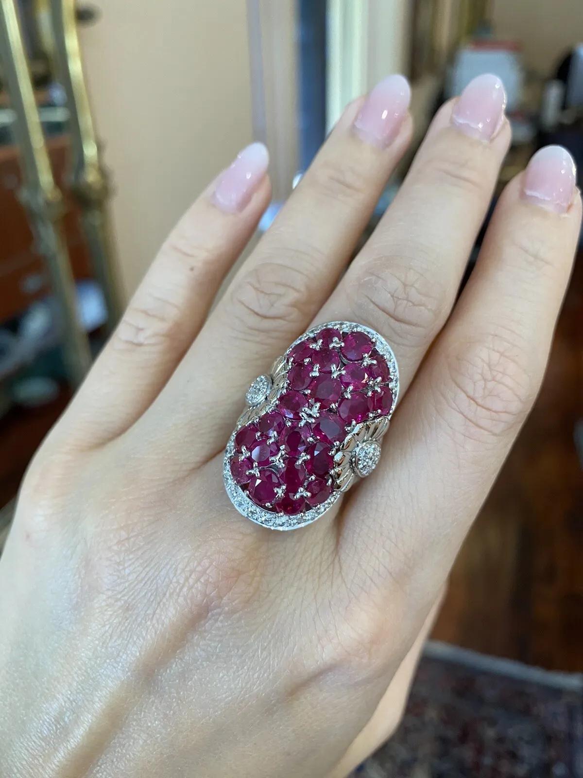 Large Oval Ruby Pavé Dome Ring with Diamonds in Platinum

Large Ruby and Diamond Ring features 23 Large Oval Red Rubies Pavé set in dome setting accented by .97 carats of Round Brilliant Diamonds set in Platinum.

Total ruby weight is 10.56