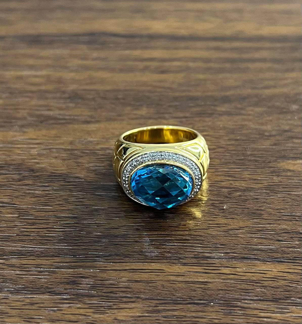 Women's Large Oval Shape Swiss Blue Topaz 14K Horizontal Yellow Gold Dome Cocktail Ring For Sale