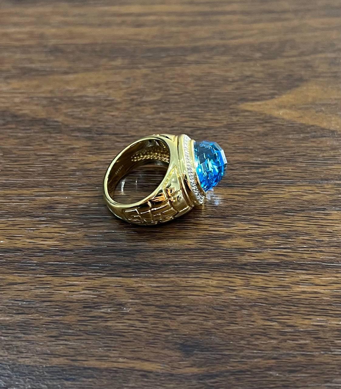 Large Oval Shape Swiss Blue Topaz 14K Horizontal Yellow Gold Dome Cocktail Ring For Sale 1