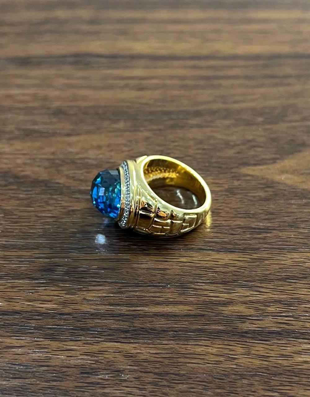 Large Oval Shape Swiss Blue Topaz 14K Horizontal Yellow Gold Dome Cocktail Ring For Sale 2