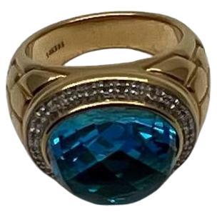 Large Oval Shape Swiss Blue Topaz 14K Horizontal Yellow Gold Dome Cocktail Ring