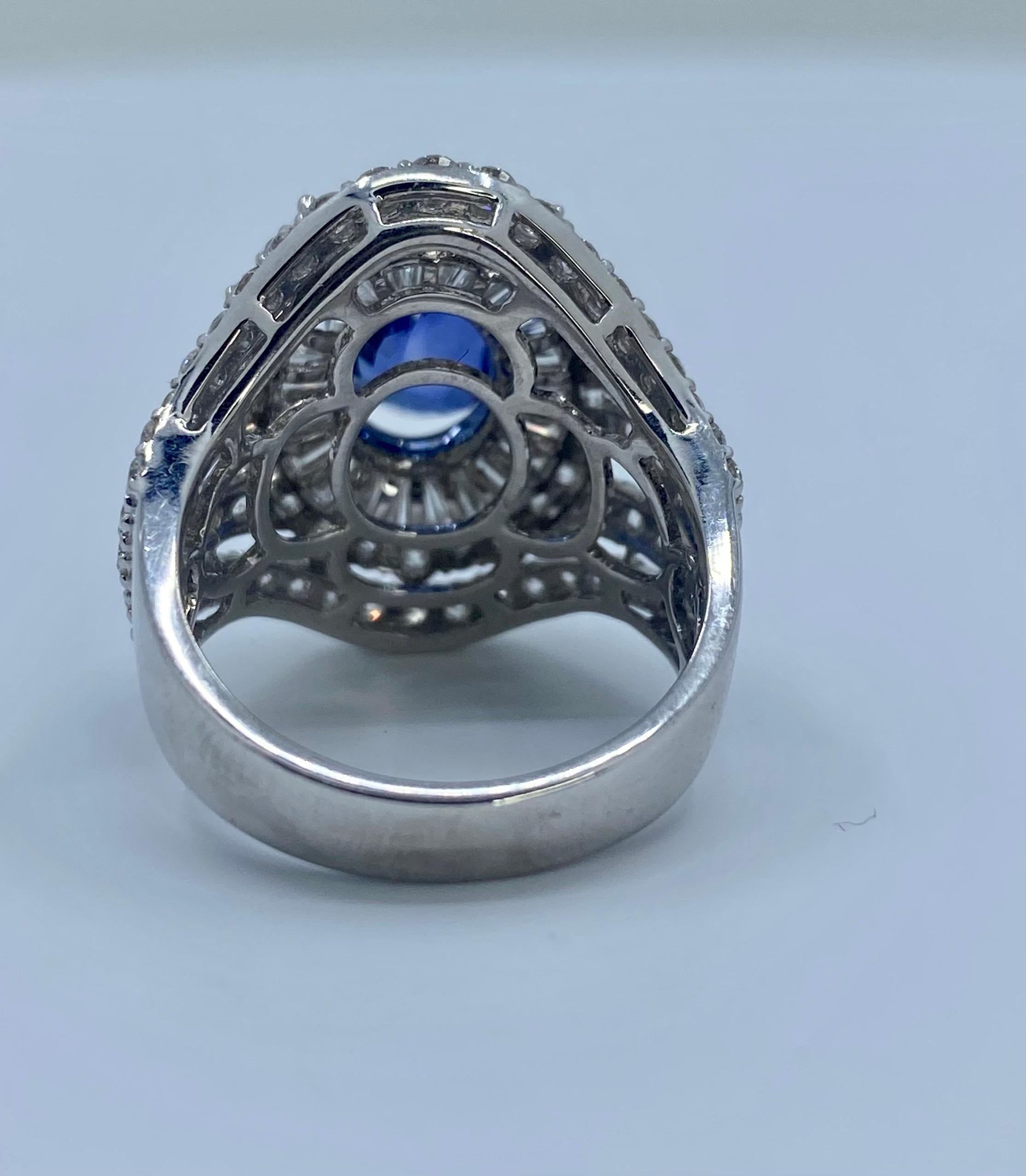 Large Oval Shaped Vivid Blue Sapphire and Diamond 9.20 Carat 18 Karat Gold Ring 4