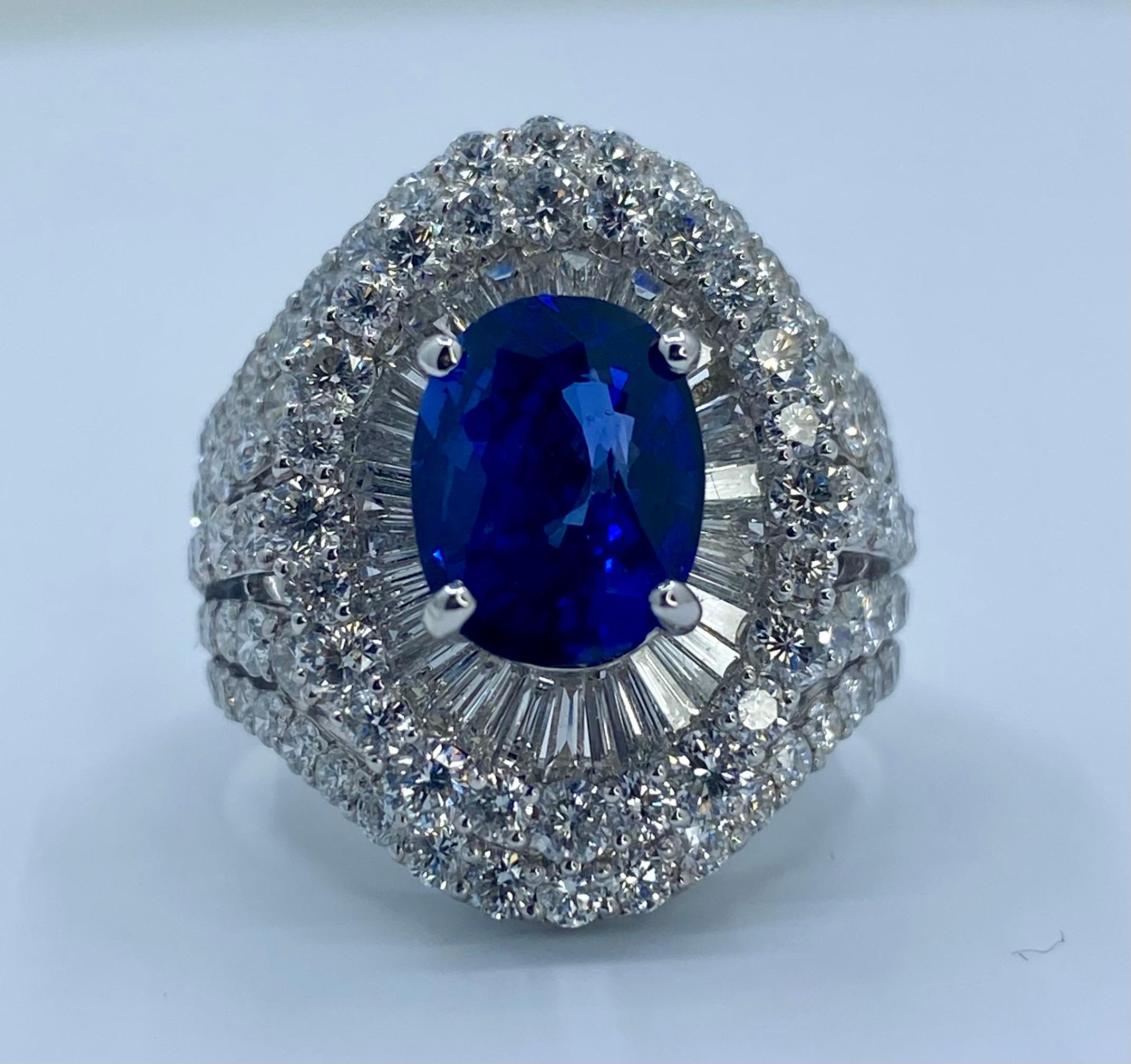 Women's Large Oval Shaped Vivid Blue Sapphire and Diamond 9.20 Carat 18 Karat Gold Ring