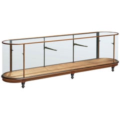 Large Oval Showcase in Oak and Glass