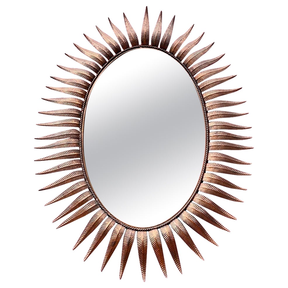 Grand miroir ovale espagnol Sunburst en cuivre des années 1950