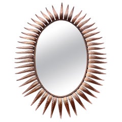 Grand miroir ovale espagnol Sunburst en cuivre des années 1950