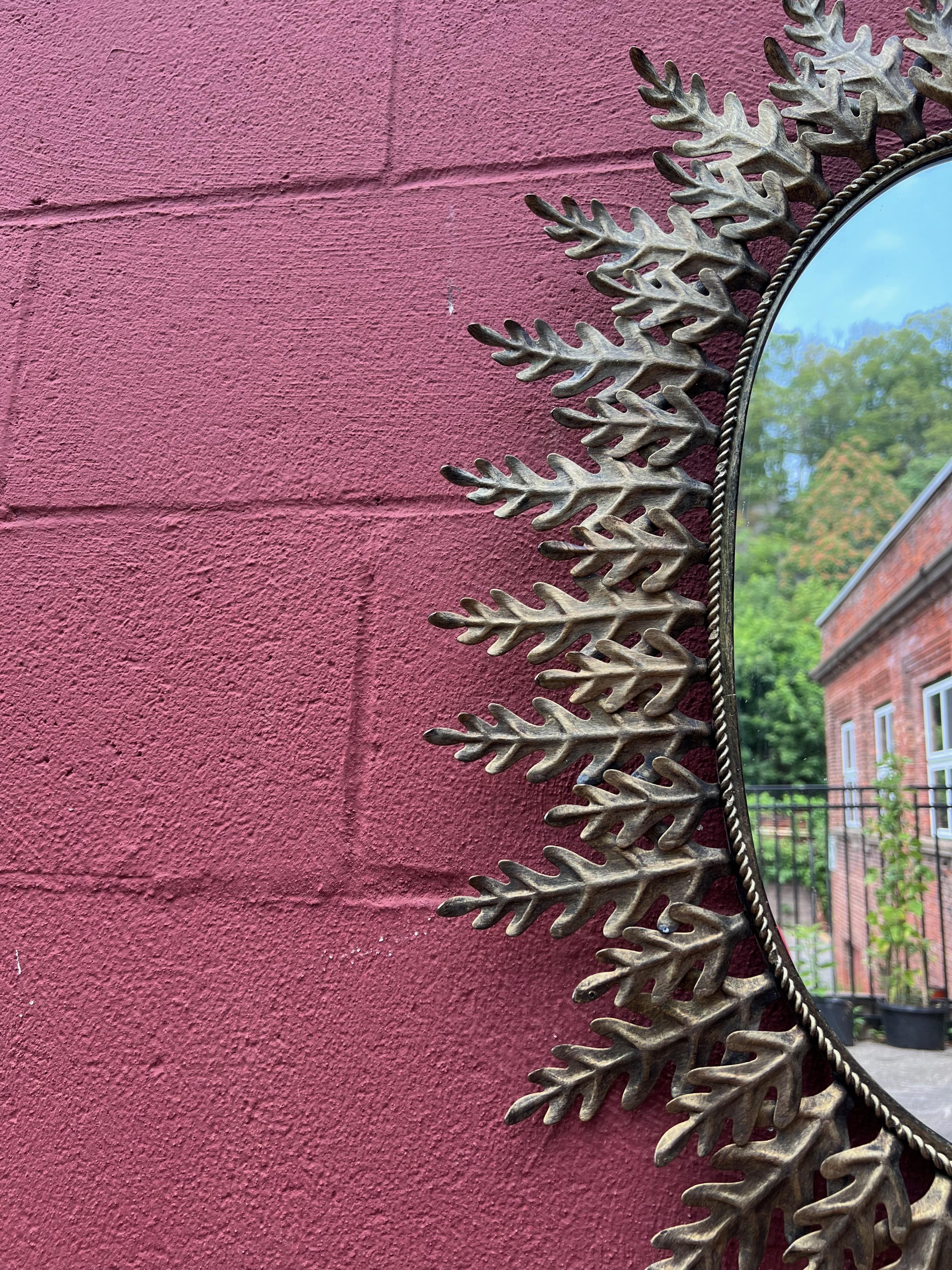 Mid-20th Century Large Oval Spanish Gilt Metal Sunburst Mirror