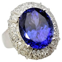 Large Oval Tanzanite and Pave Diamond Halo 18 Karat White Gold Cocktail Ring
