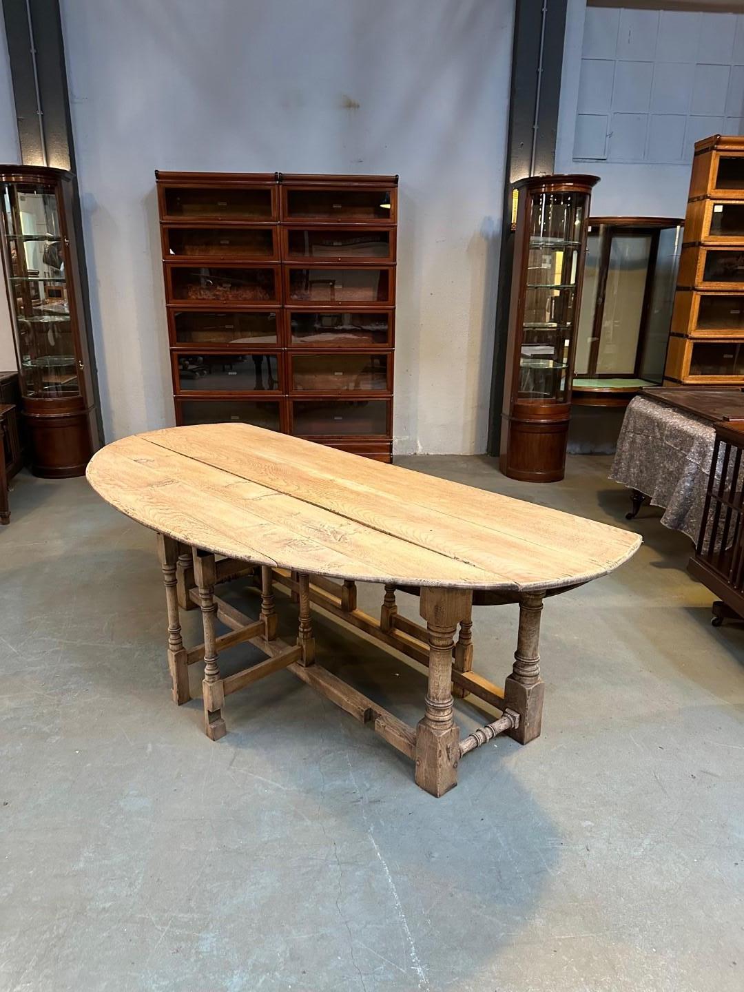 Late 20th Century Large oval white oak table in good For Sale