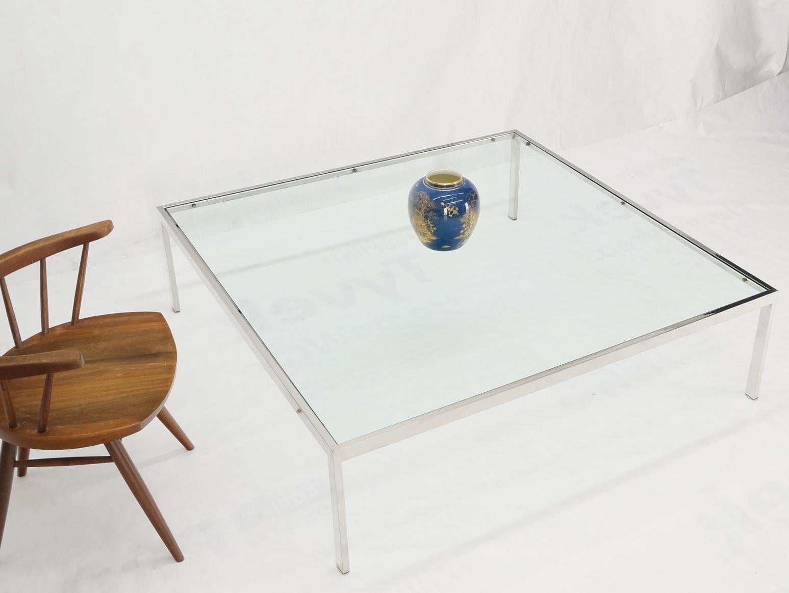 Mid-Century Modern large chrome polished stainless steel glass top square coffee table. Measure: 54