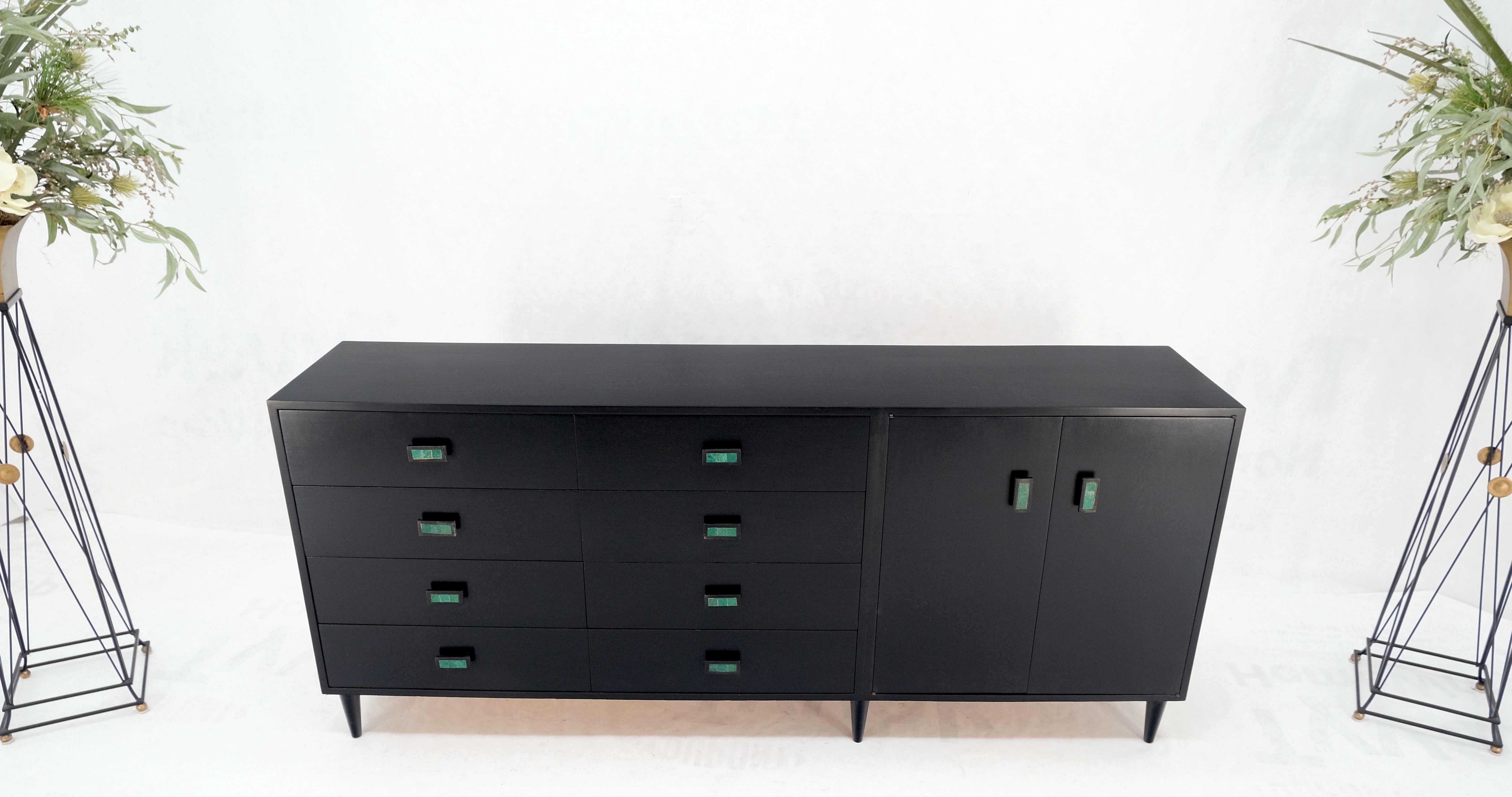 Large oversize long ebonized black lacquer credenza dresser dowel cone legs mint.
Doble doors compartment with shelves.