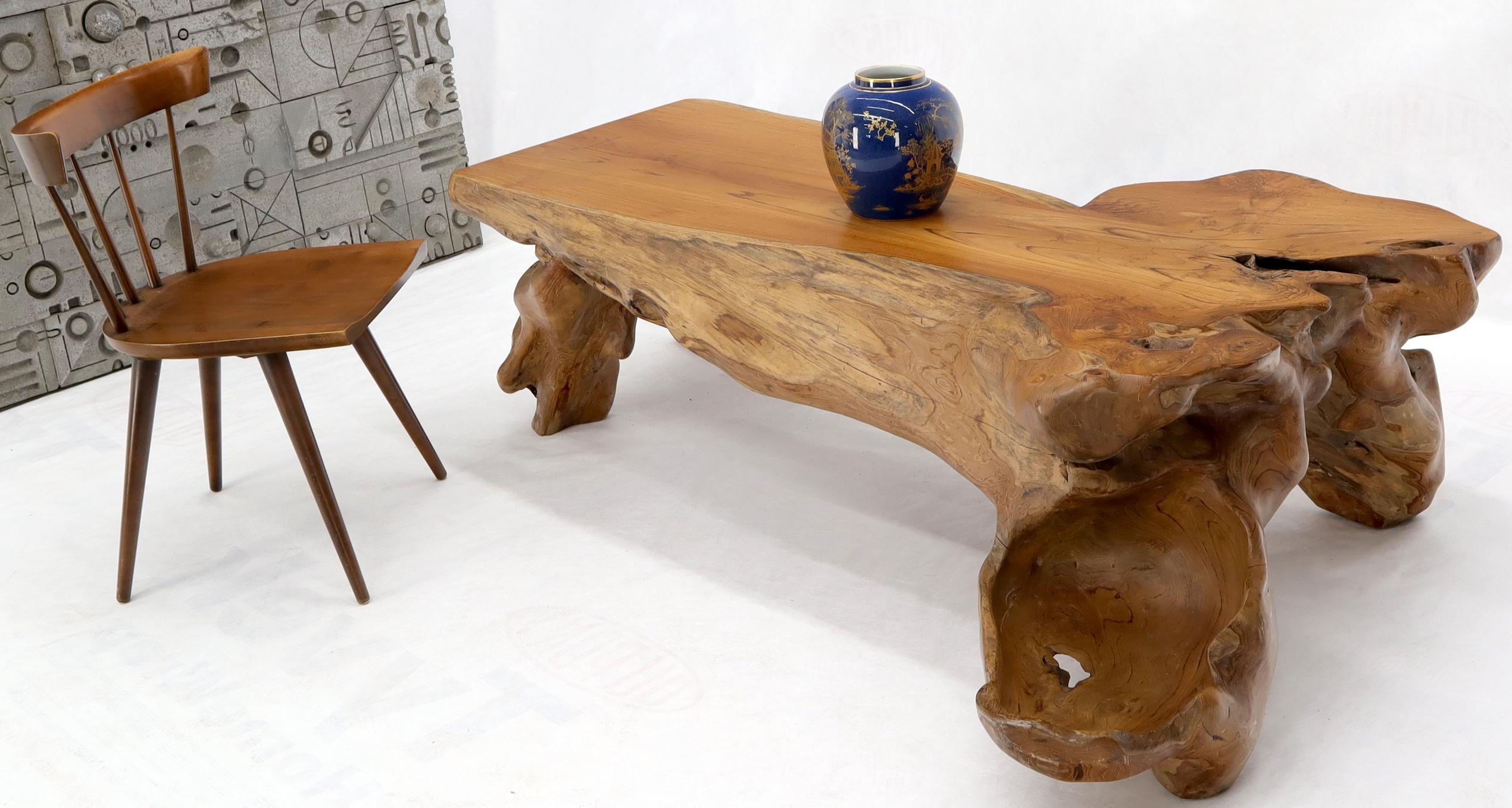 Mid-Century Modern decor large and heavy, super sturdy solid chunk slab of teak coffee center table. Beautiful natural oil/varnish finish. May be used a base for larger glass top coffee table. One of the 