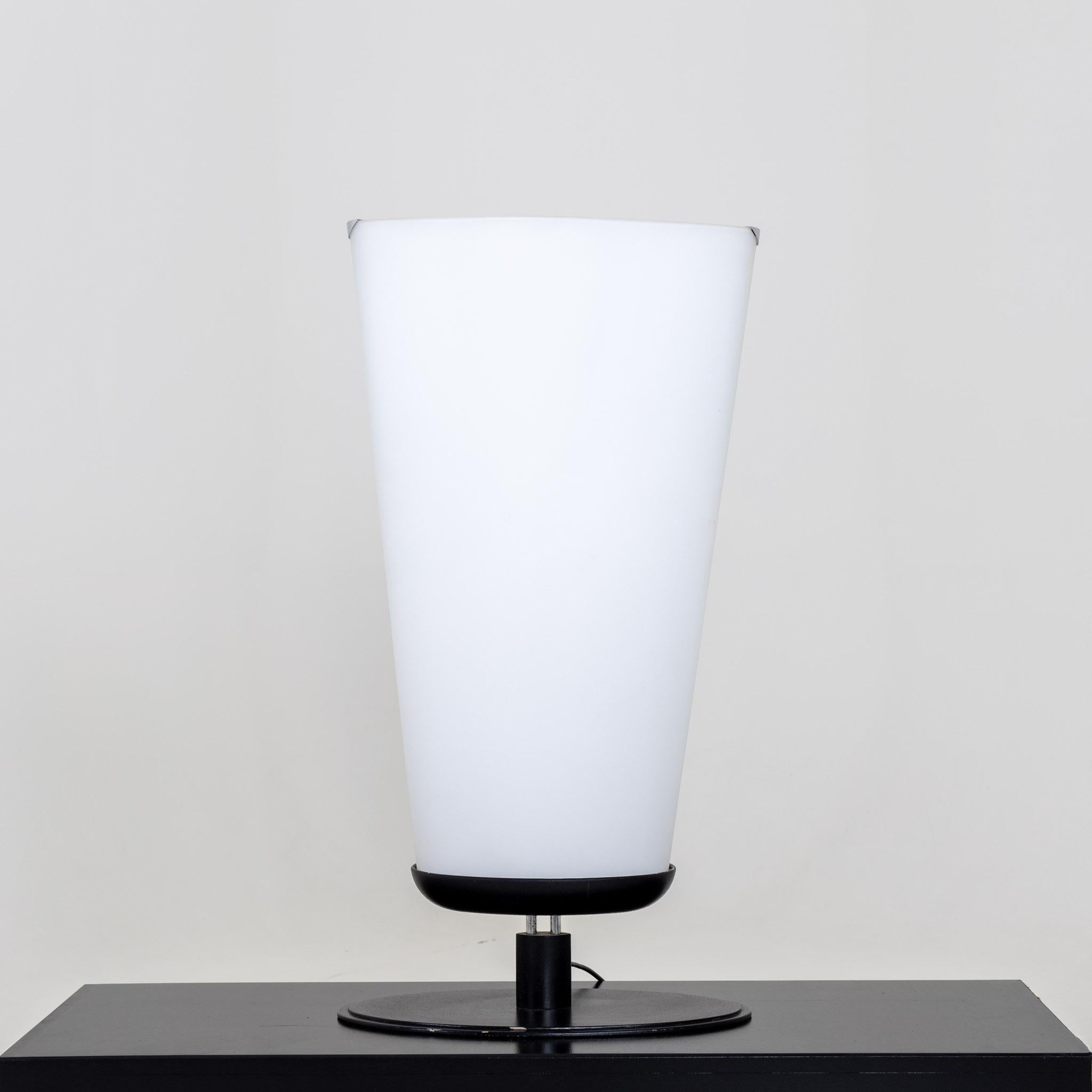 A large oversized Lucos Modernist table lamp. 
Frosted glass with a painted metal base.