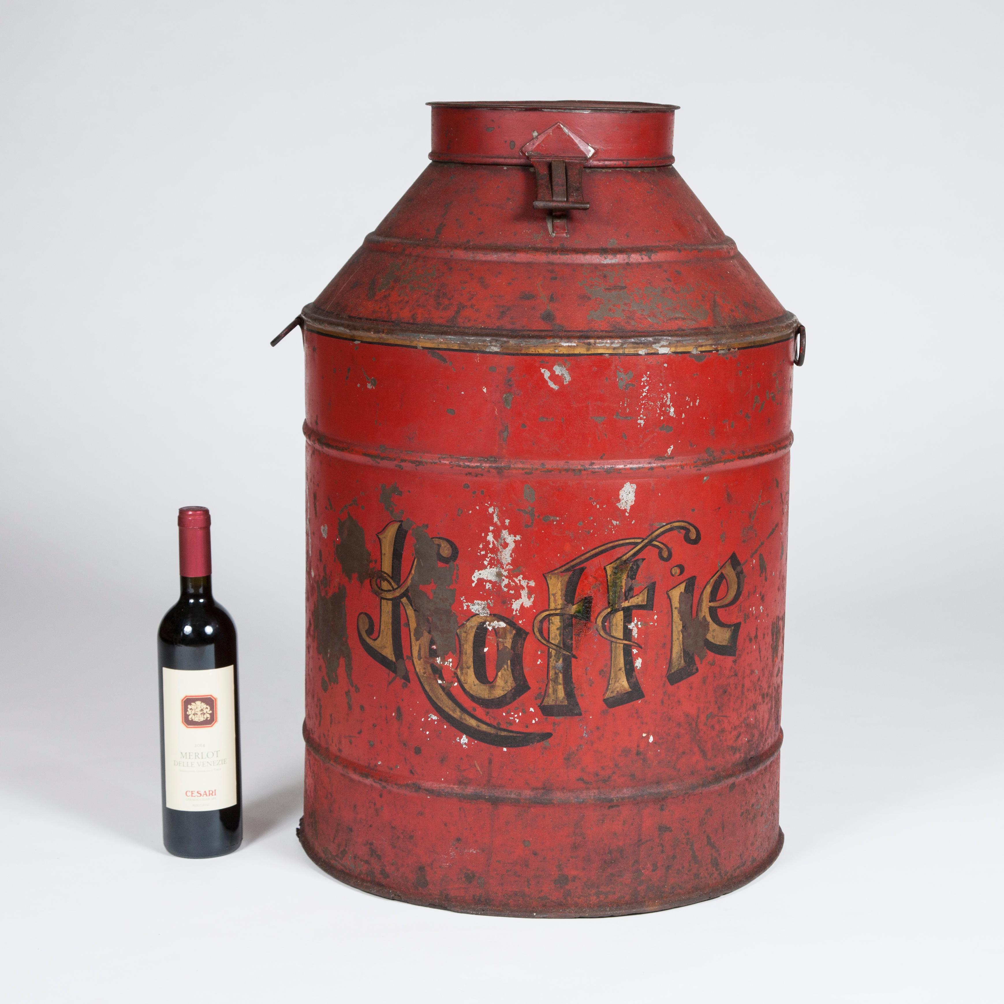 A large early 20th century Dutch painted circular tin coffee container, marked Koffie.