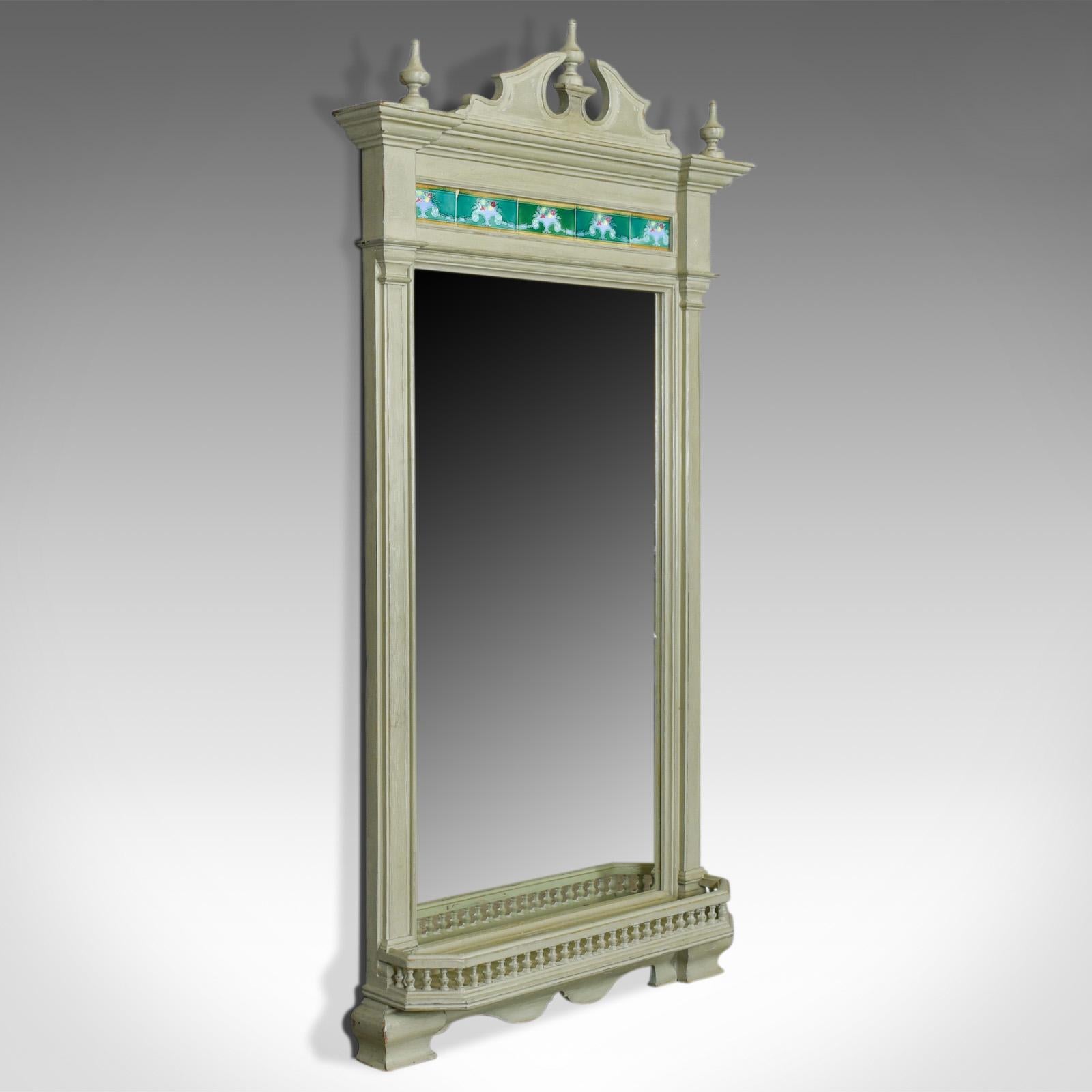 This is a large, painted antique wall mirror, an English, Victorian overmantel or pier mirror with tiles and gallery, dating to the late 19th century, circa 1890.

A super decorative mirror with a pale sage green finish
Displaying classical